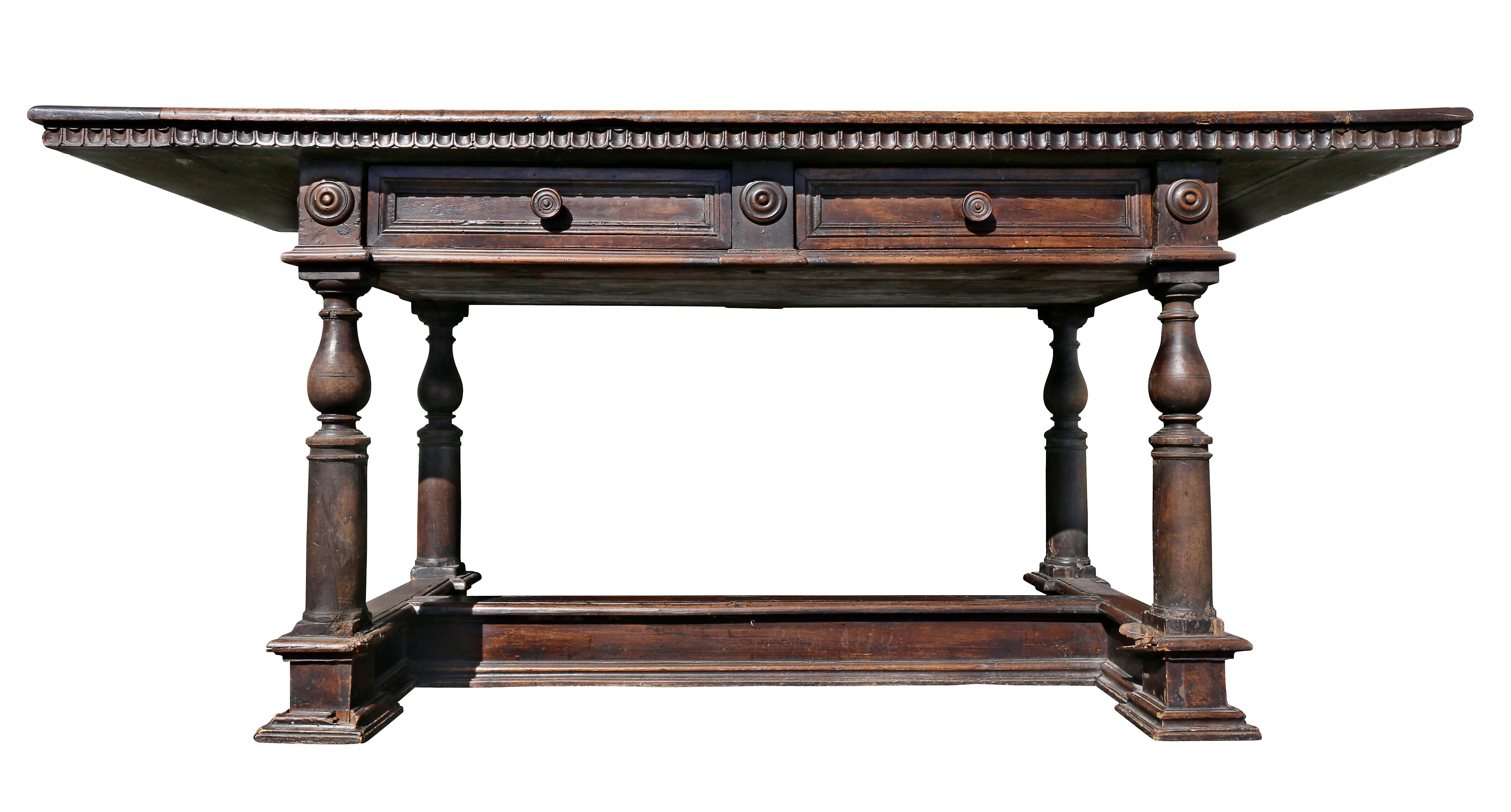 With rectangular top over two drawers raised on turned legs with H form stretcher.