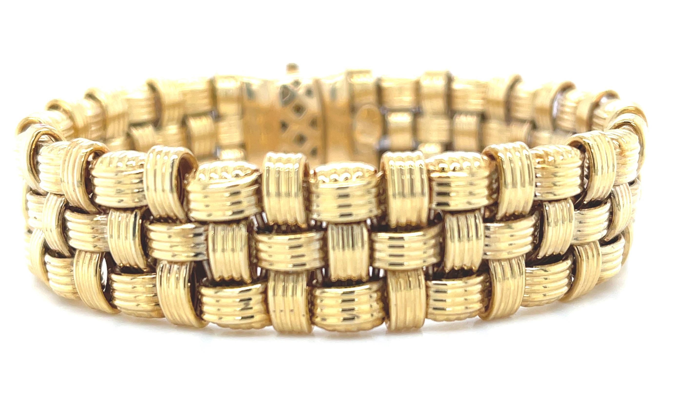 This gorgeous 14k yellow gold Italian bracelet features a beautifully detailed basket weave design that is so stylish and sophisticated, you can wear it everyday and on special occasions! A bold, impressive look,  this wide, flexible bracelet is so