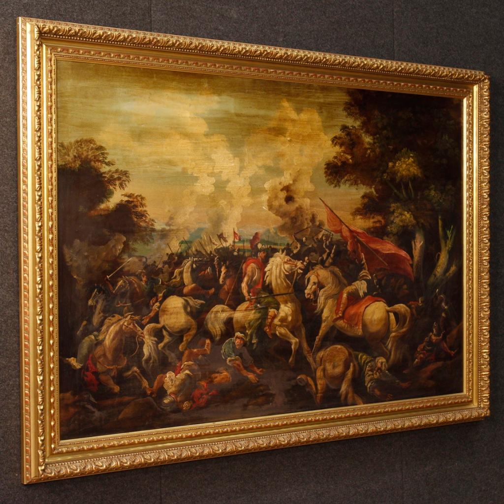 Italian painting from 20th century. Work oil on canvas depicting a great battle in 18th century style of good pictorial quality. Exceptional decor framework with carved and gilded wooden frame of excellent quality. Painting of great measure and