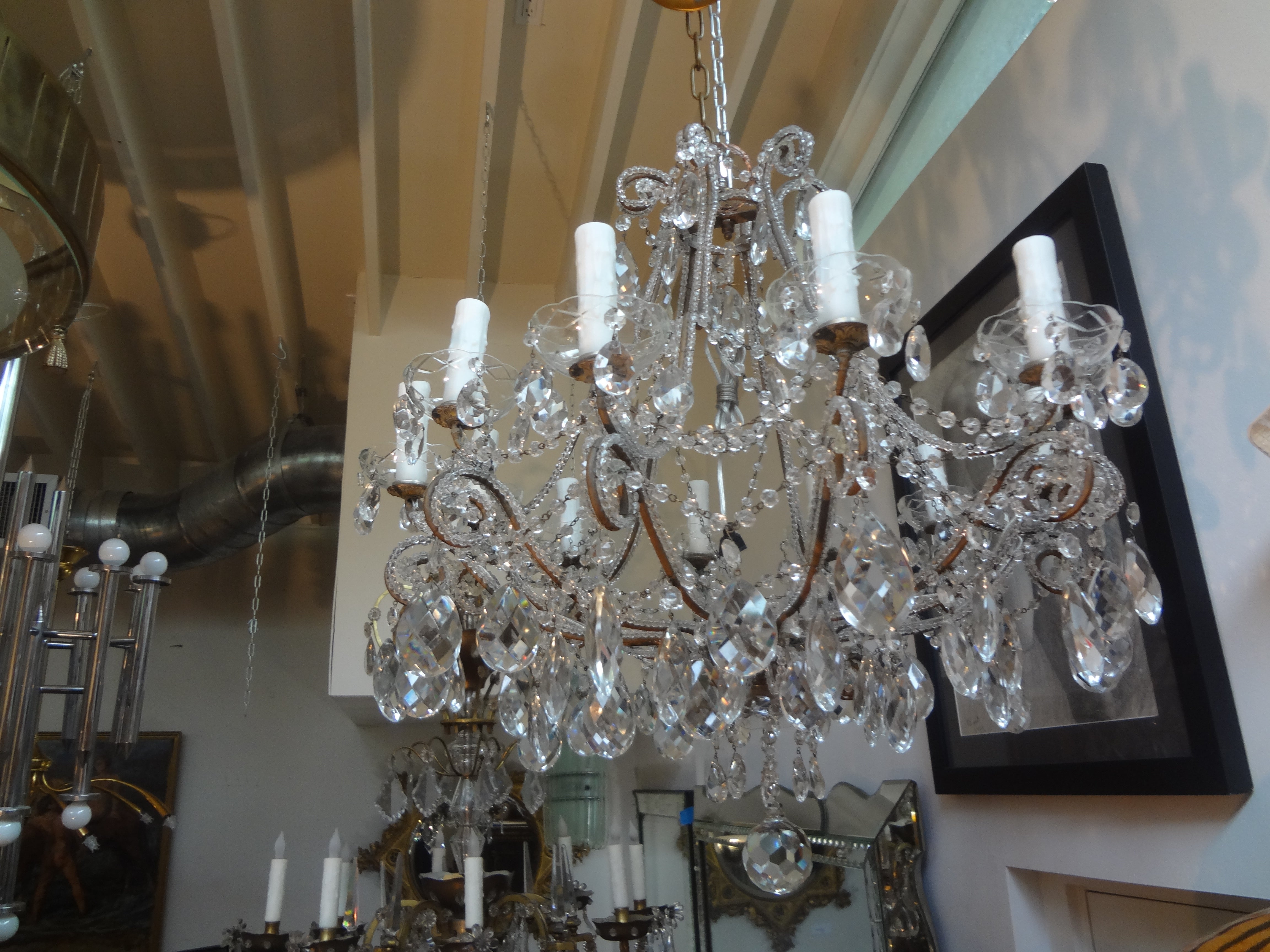 Italian Beaded And Crystal Chandelier
Stunning antique Italian beaded and crystal 12 light chandelier.
This lovely Italian Maison Bagues style crystal chandelier has been newly wired with new sockets for the U.S. market.
Good antique condition.