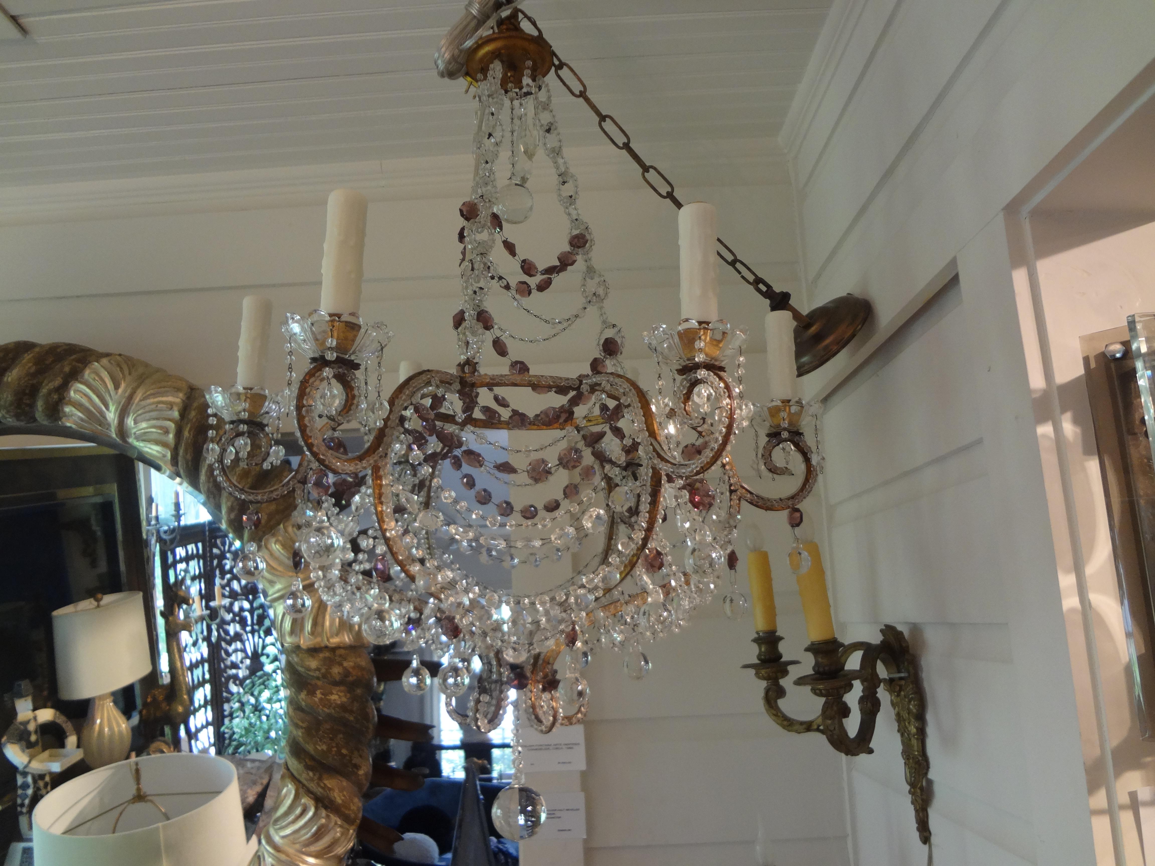 Stunning antique Italian beaded clear and amethyst (Purple) crystal chandelier. This lovely Italian Louis XVI style six-light crystal chandelier measures: 32.5 inches high and 26 inches in diameter. Needed height can be attained by adding the