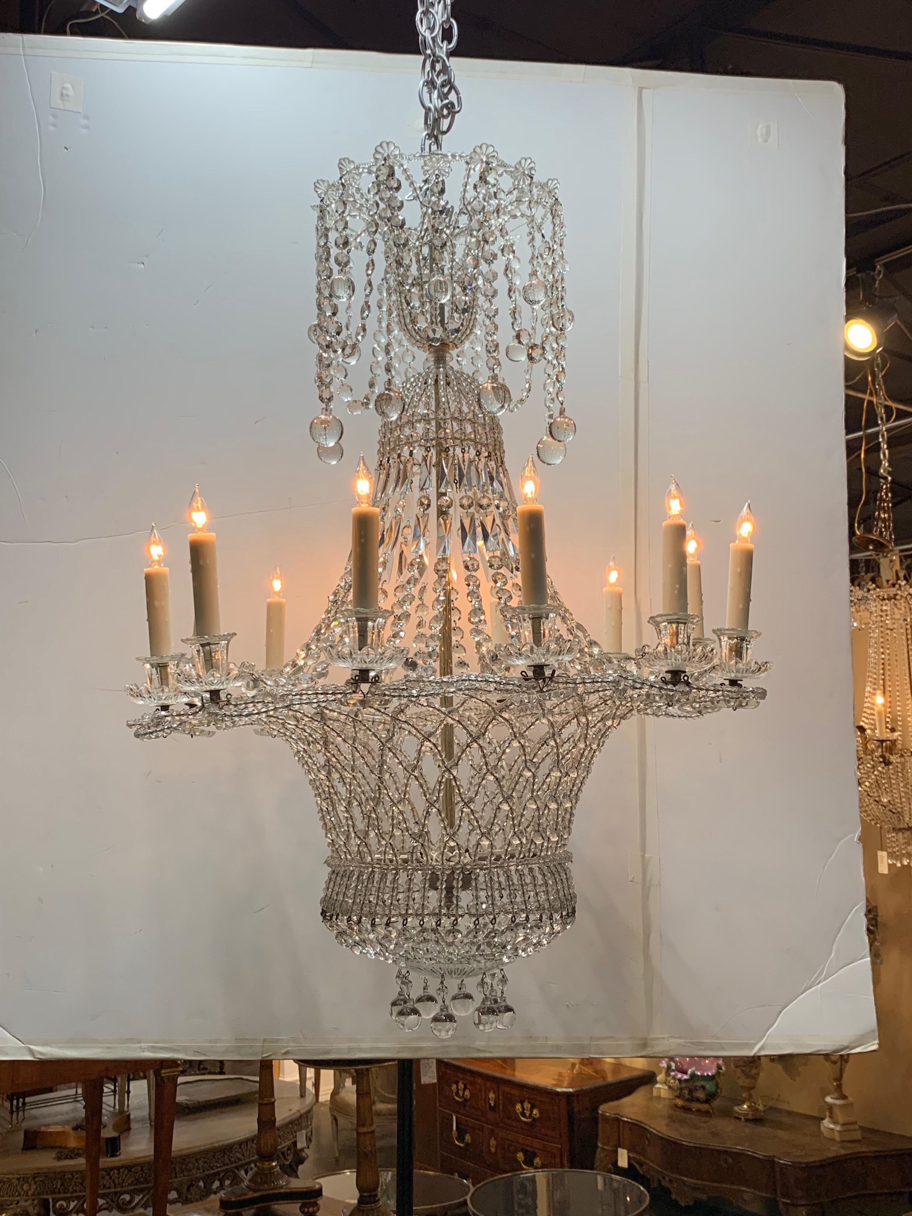 Lovely Italian beaded crystal basket form chandelier with 12 lights,

circa 1920.