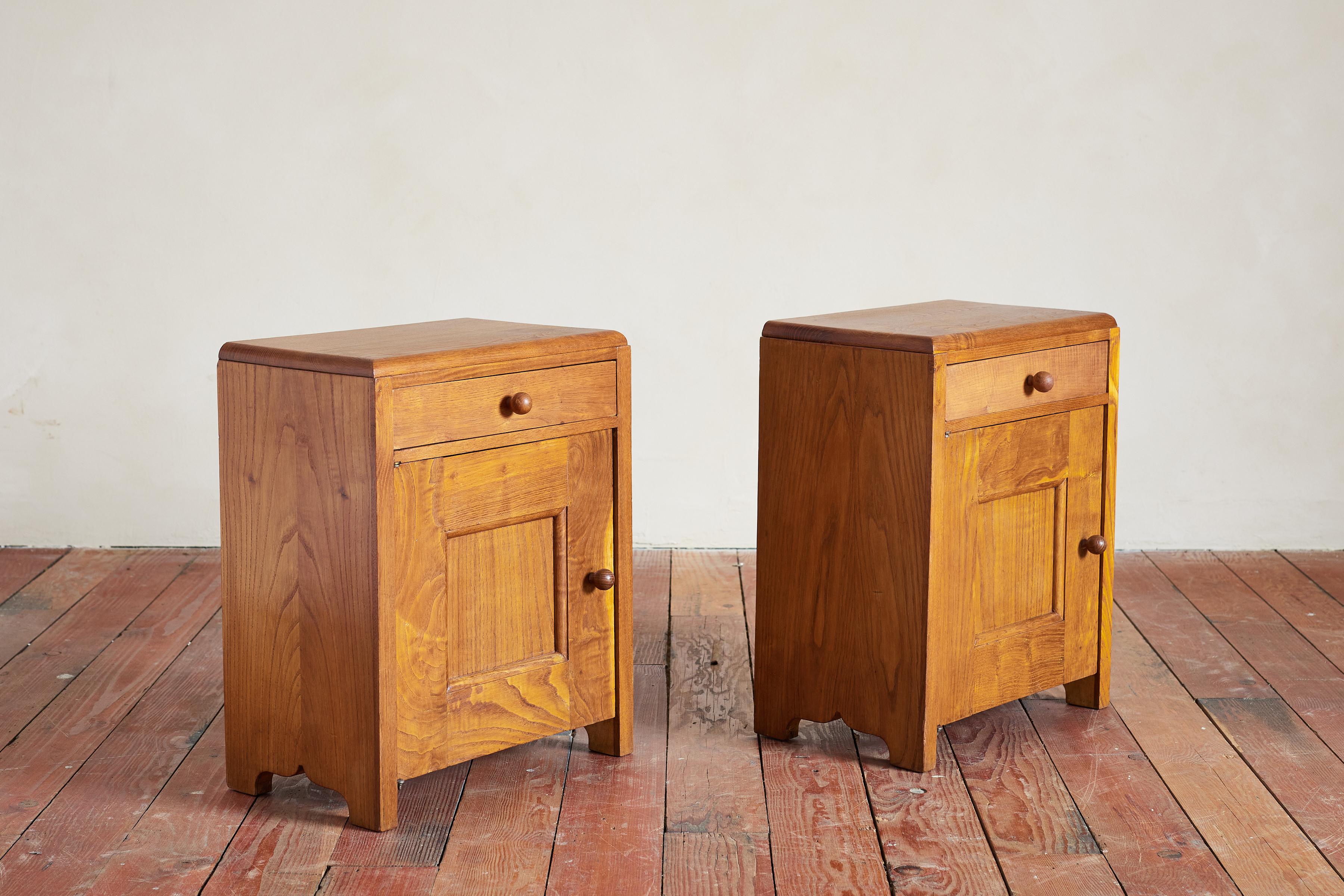 Wonderful pair of Italian bedside tables with slim proportions and a rich warm patina. 

Single door with open shelf cabinet and single drawer for personal items 

Great scale and charm 

Italy 1960's 