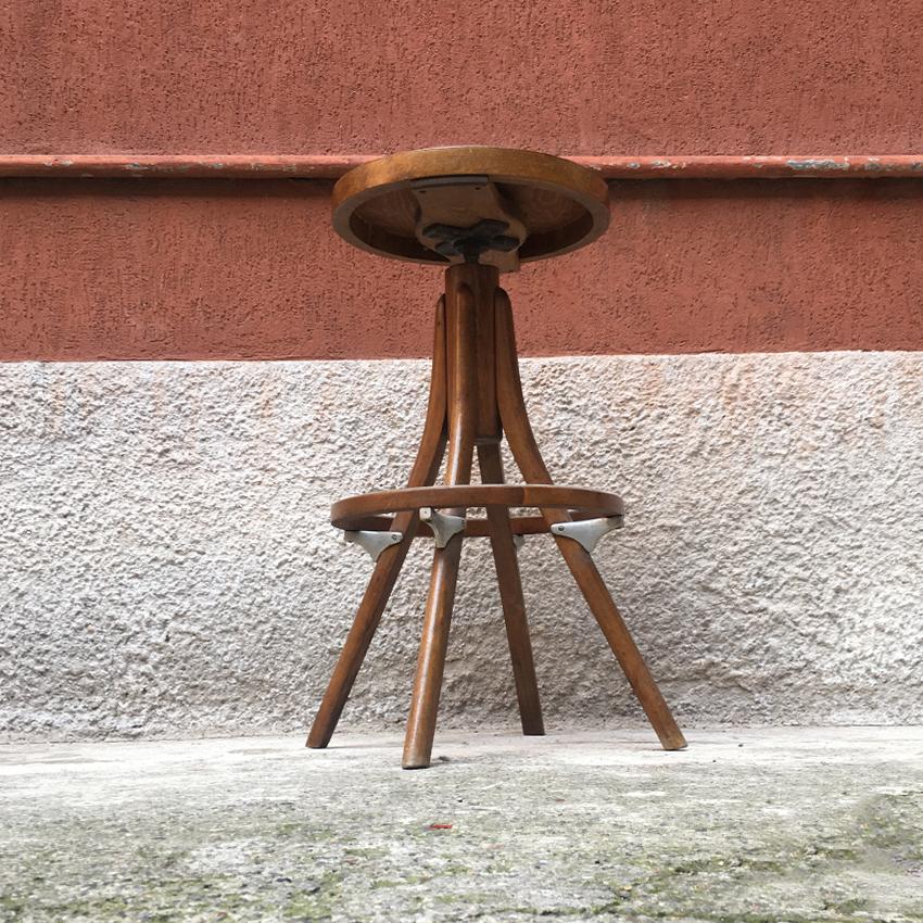 Italian beech and steel adjustable stool, 1950s. Beautiful adjustable stool, once used to work with the drafting machine, with beech structure and details in satin steel.