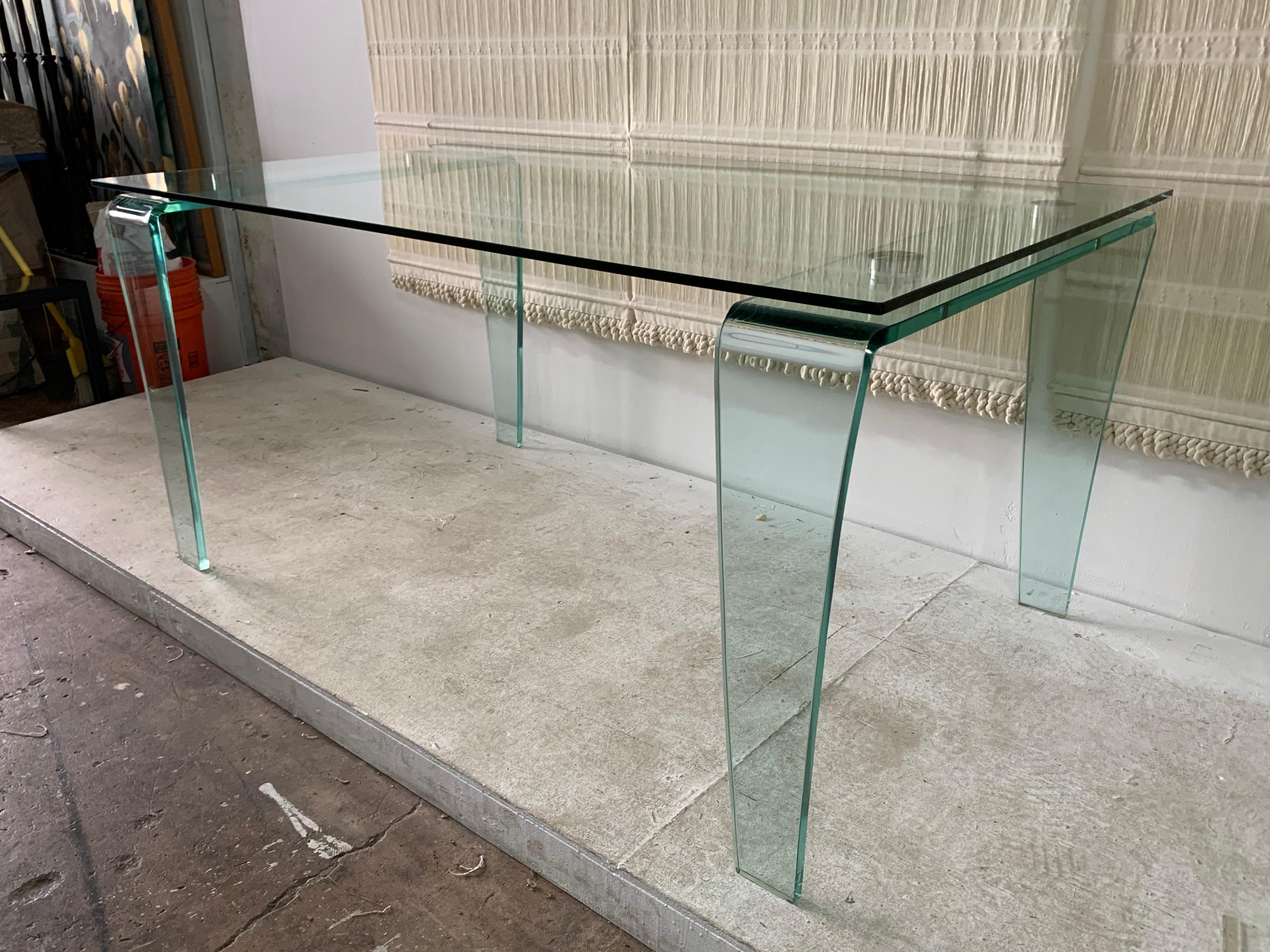 italian newscaster glass desk