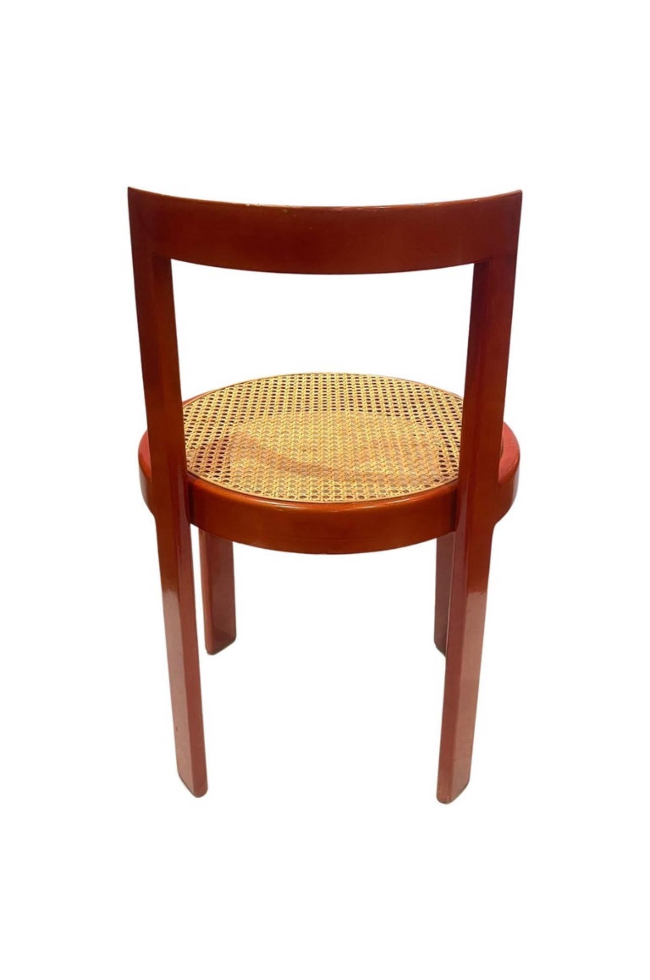 Fabulous set of 4 Italian red wood lacquered dinning chairs with cane seats , beautiful color hard to find nice condition with normal light wear.