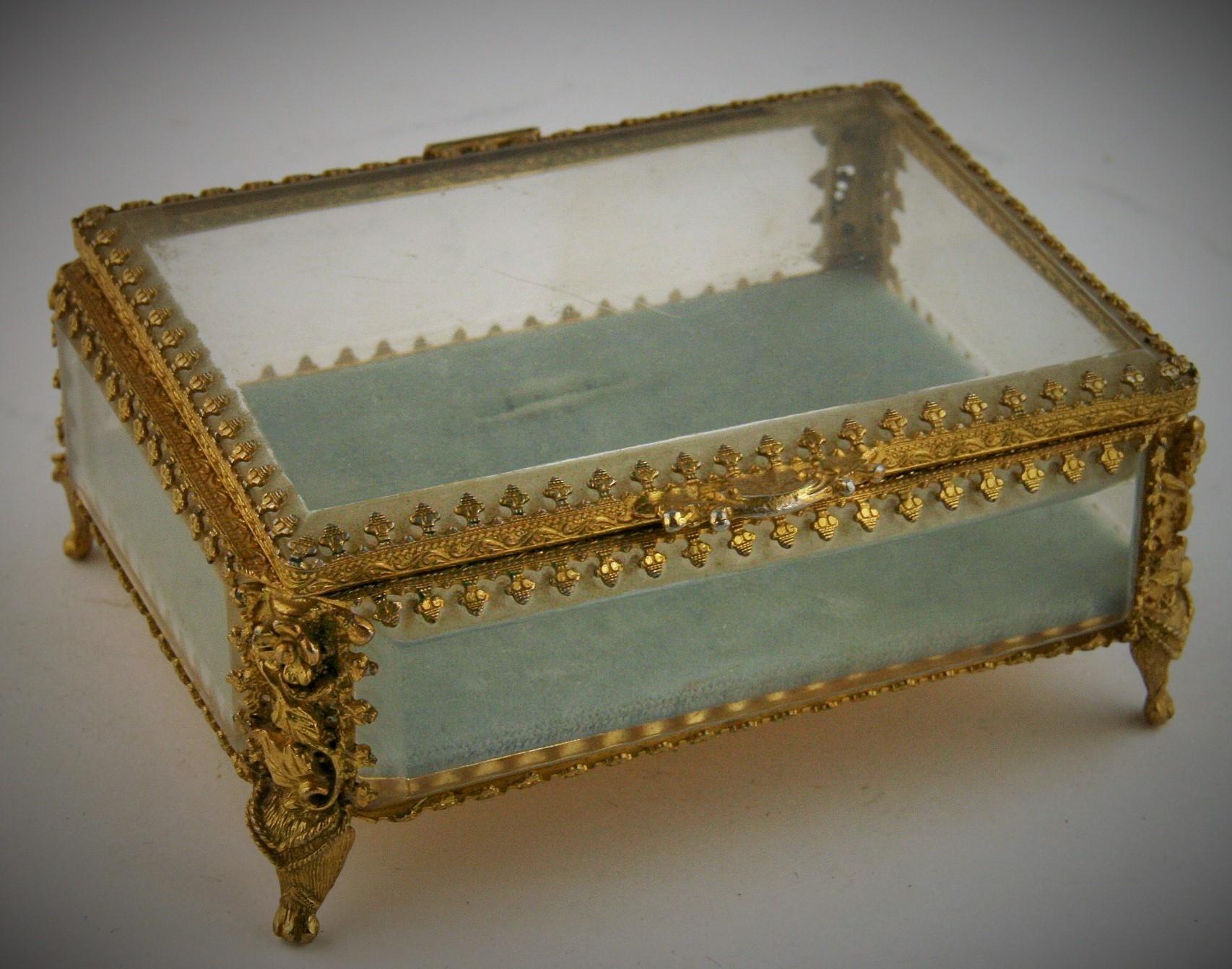 8-255 Italian beveled glass and ornately detailed gilt brass with velvet liner.