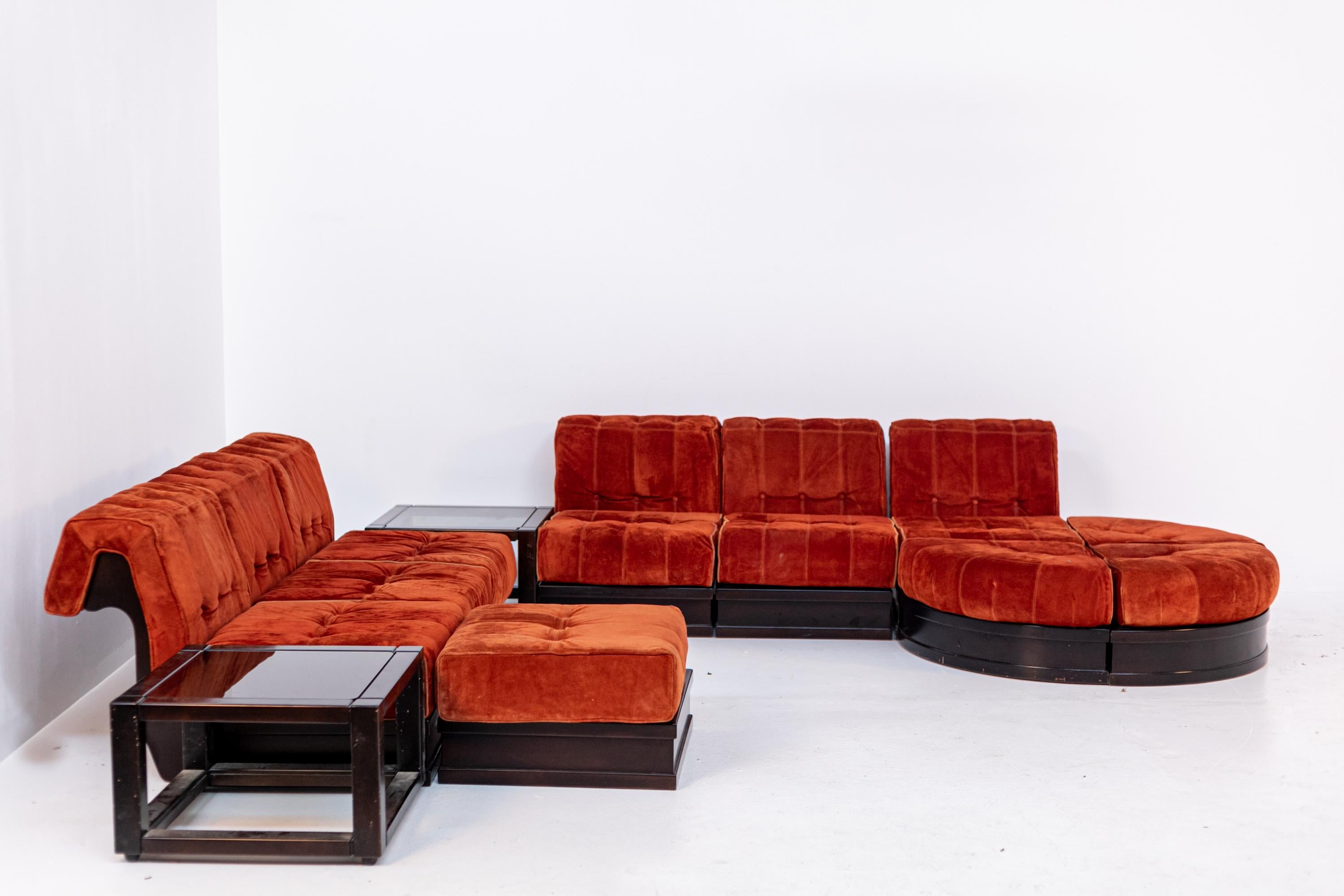 Large corner sofa by Luciano Frigerio of the 60's model Can Can. The large sofa is made of armchair and modules so its composition can be transformed continuously in any version we want to compose it. In this picture we see the sofa is in its corner