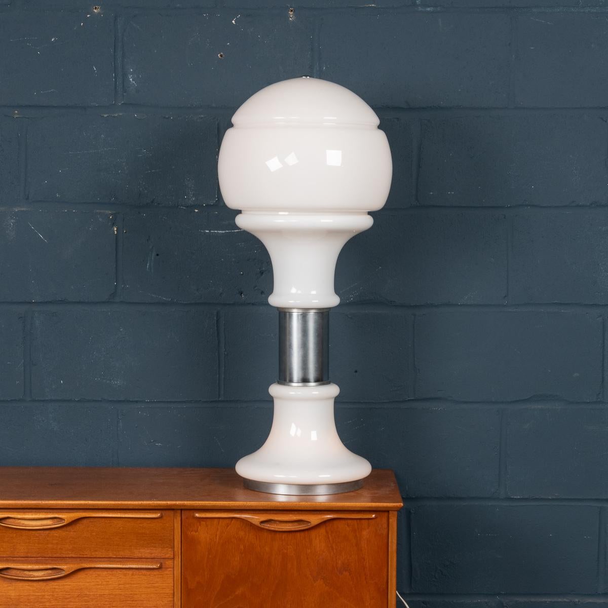 A wonderful vintage Italian table lamp made by Carlo Nason for Mazzega. Produced in Murano, Venice in the 1970's, this chrome and glass lamp exemplifies Carlo Nason’s workmanship. Nason has used a gorgeous white milky glass which gives a fantastic