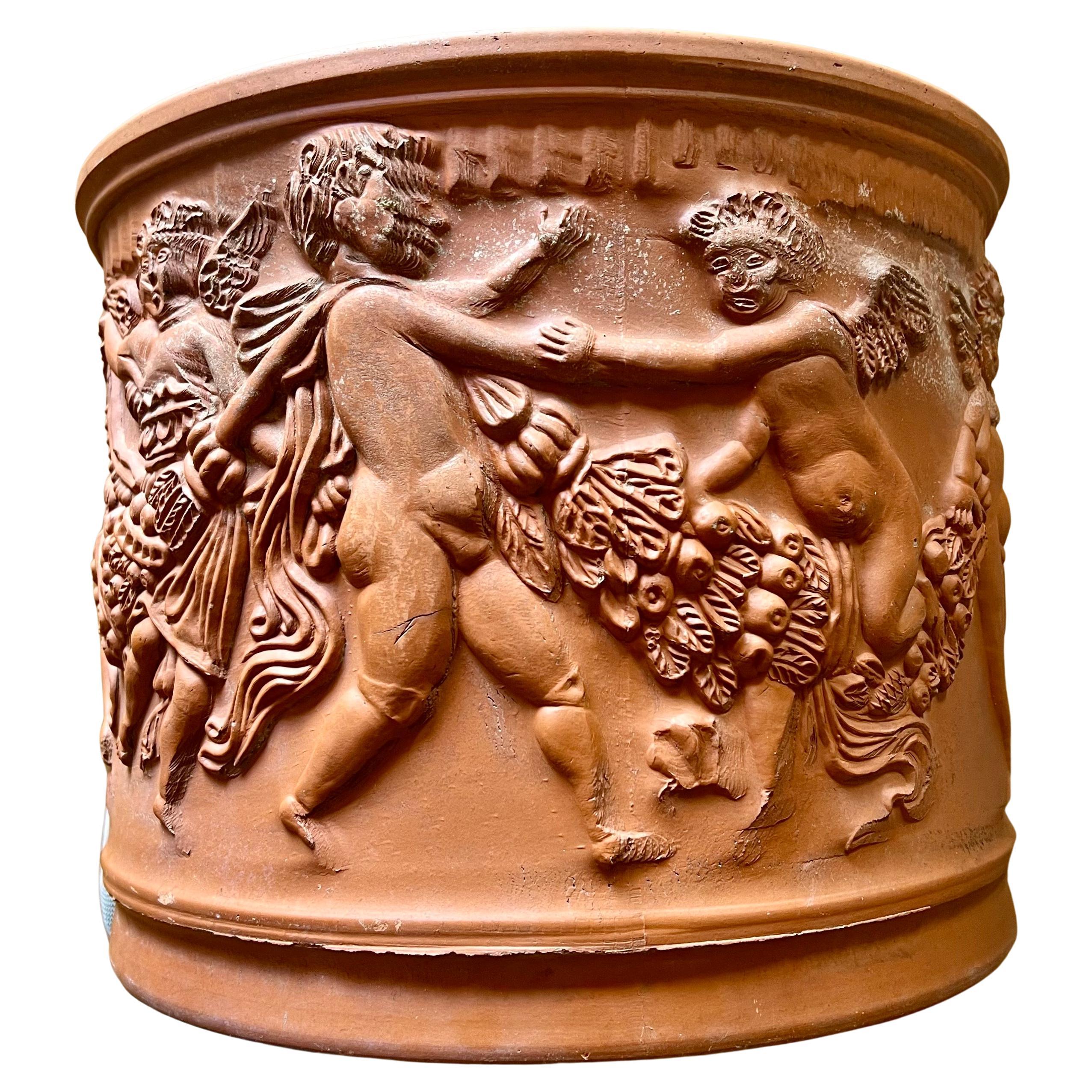 Large Italian Bitossi red terracotta Cherub Putti garden planter flower pot. Item features decorated with frieze of dancing putti carrying fruity festoons, marked with Bitossi manufacturing impression