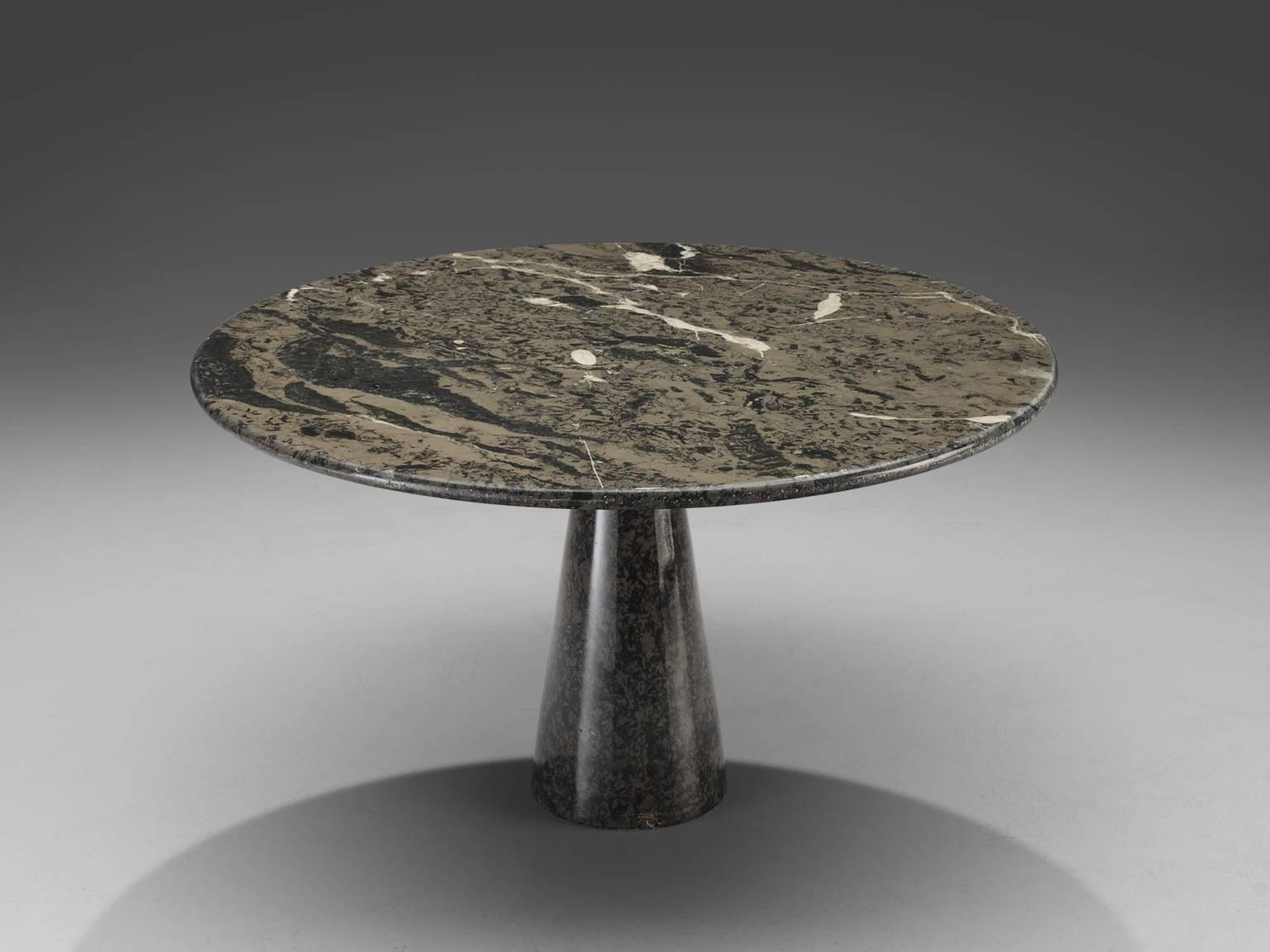 Table, marble, Italy, 1970s

This patterned deep grey to black table is designed in postwar, Italy. The circular top rests perfectly on the cone. The design showcases a play of balance and rhythm. The design is architectural in the sense that the