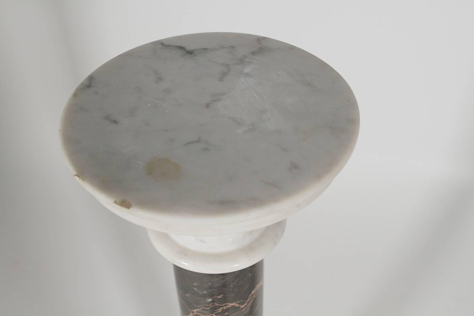 Italian black and white marble pedestal, circa 1900. Neoclassical from with white marble top and base, with centre column in a black based marble. Some age related wear to top.