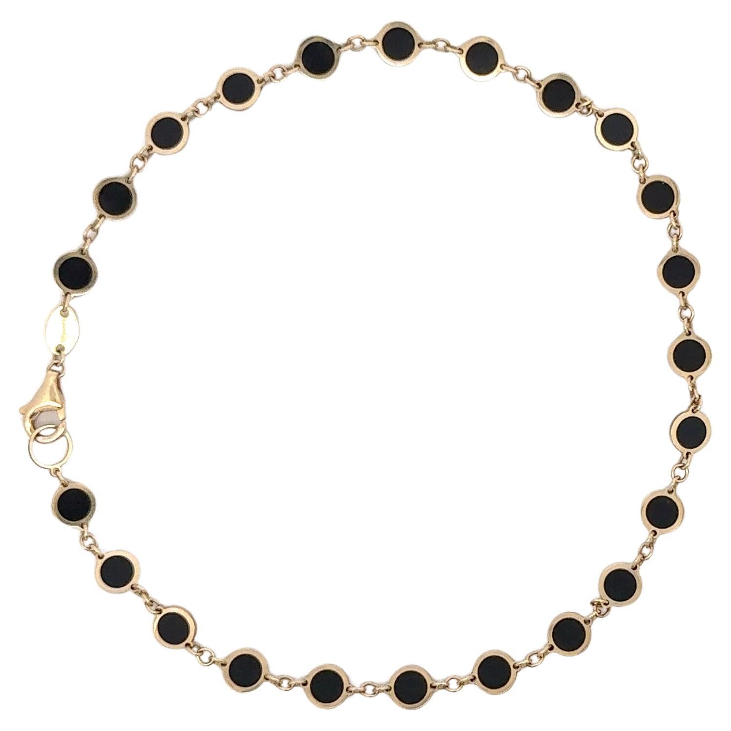 Italian made, this 14 karat yellow gold anklet features black enamel disc links weighing 3.1 grams.
Available in different colors & shapes
DM for more info