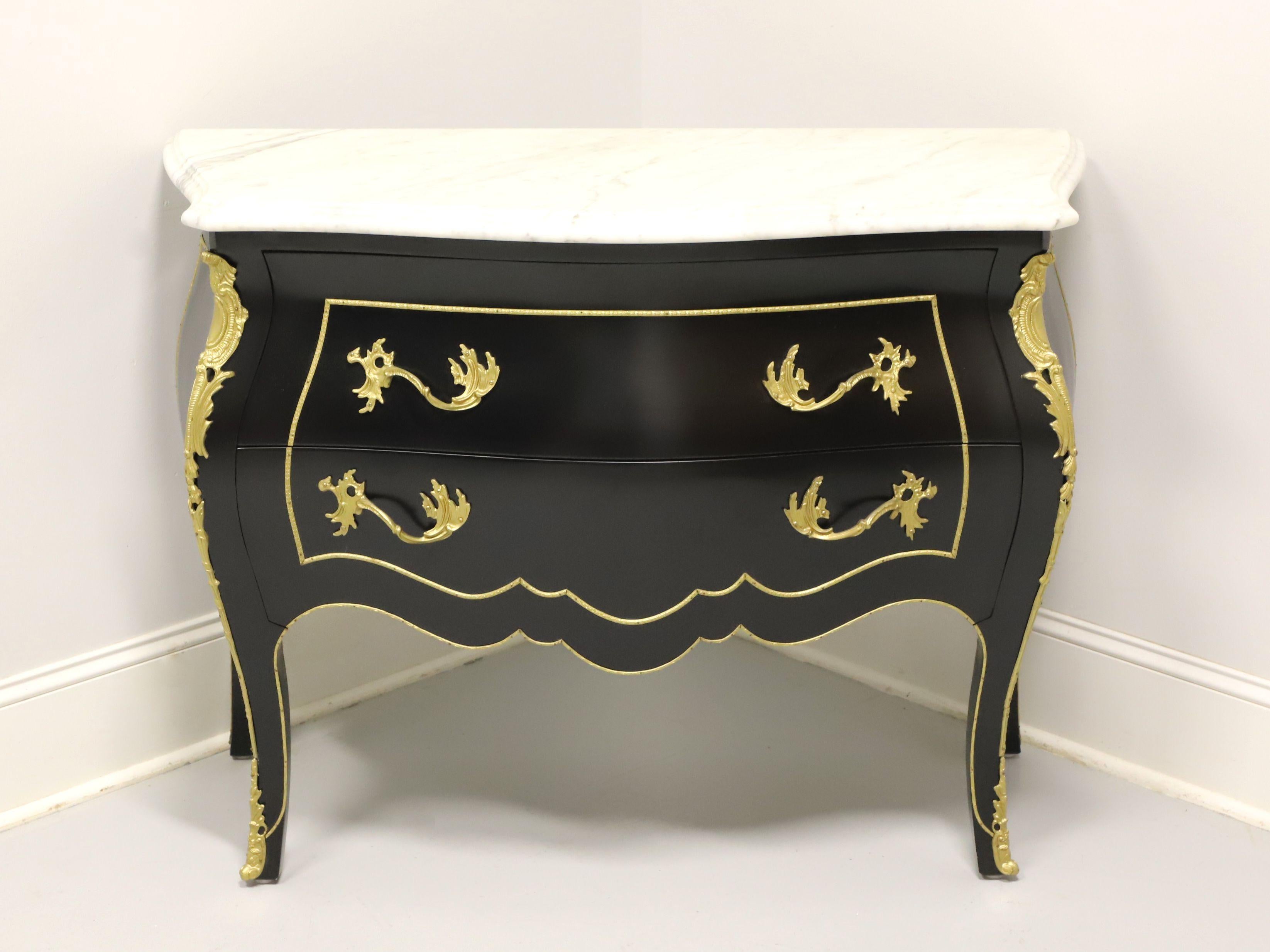 A late 20th century reproduction of an Italian style bombe chest, unbranded. Hardwood with black lacquer, removable marble top, brass hardware, brass ormolu mounts and curved legs. Features two large drawers. Made in Italy.

Measures: 45w 19.25d