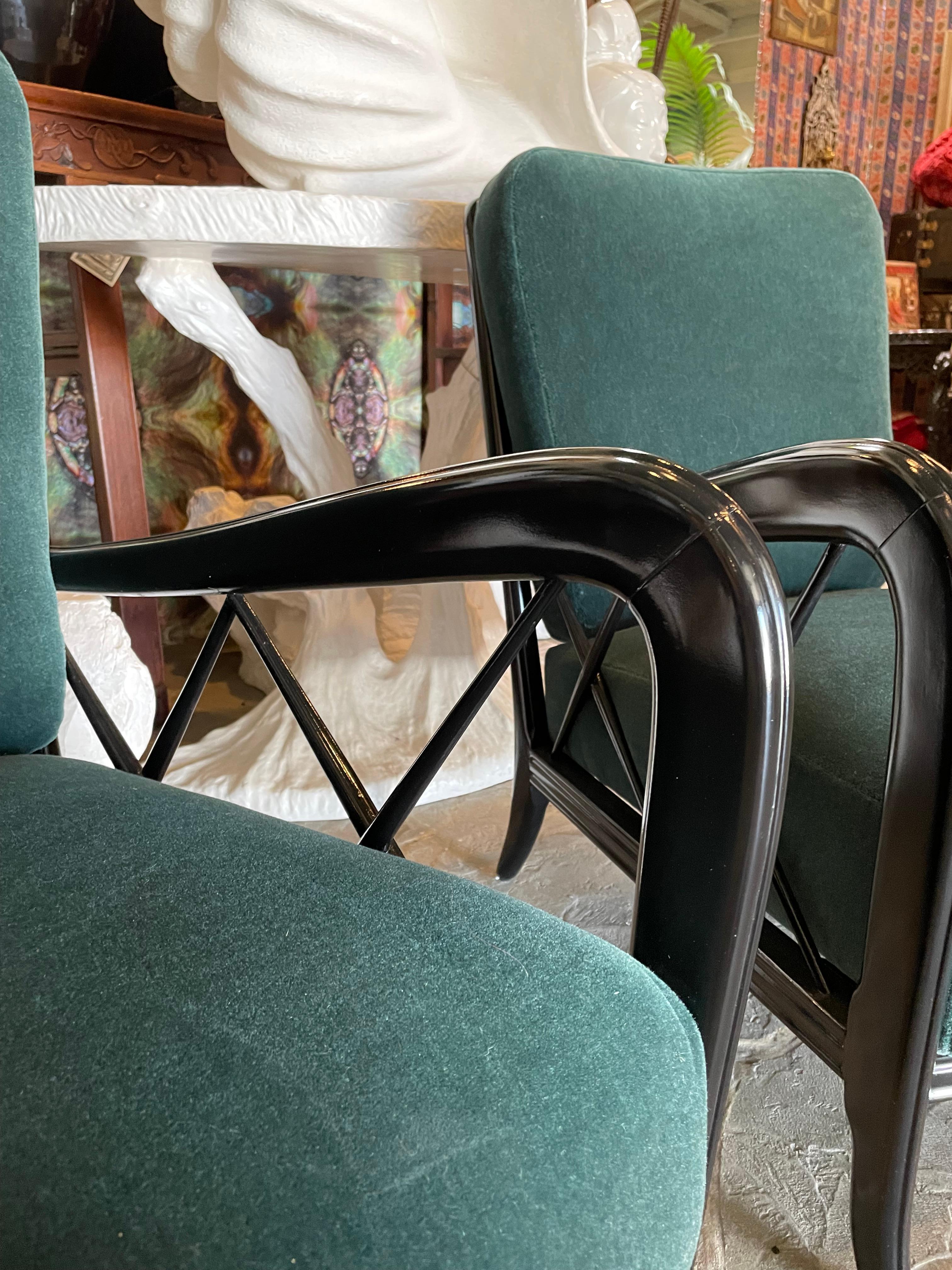 These 1940s armchairs fit perfectly as a pair of parlour or reading lounge chairs. The brick brown leather cushions are very comfortable and sit on a frame that is painted in a semi-glossy black lacquer.
