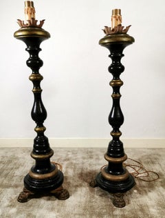 Italian Black Lacquered Wood and Burnished Gold Church Candlesticks