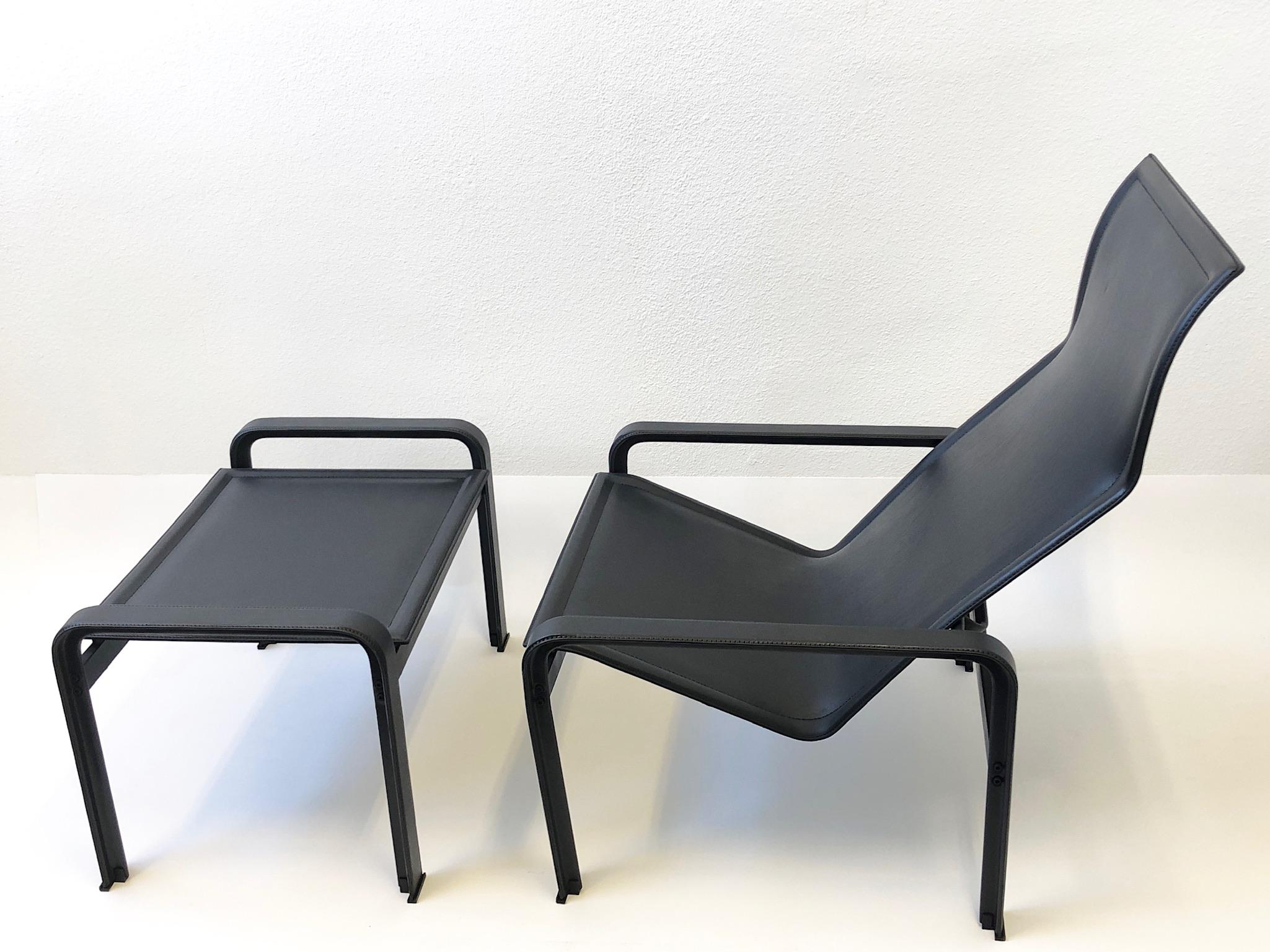 1970s Italian black leather lounge chair and ottoman by Matteo Grassi. 
Constructed of metal frame covered with black thick saddle leather. 
Newly restored, shows minor wear consistent with age. 
Both chair and ottoman are marked Matteo Grassi.