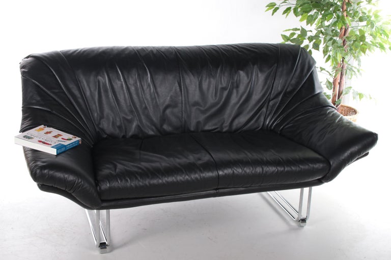 Italian black leather Postmodern 2 seater sofa, 1970s

Strictly speaking, postmodern design was a short-lived movement that manifested itself mainly in Italy and the United States in the early 1980s. The features of postmodern furniture and other