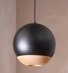 Italian black metal and beech Globe lights
