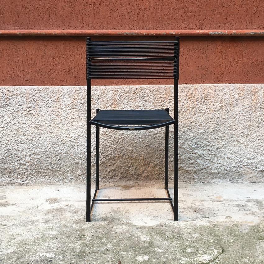 Italian black metal and Scooby dining chair, produced by Pluri Bergamo, 1970s. Dining chair from the 1970s, with black enameled metal structure and seat and back in black Scooby, produced by Pluri Bergamo.