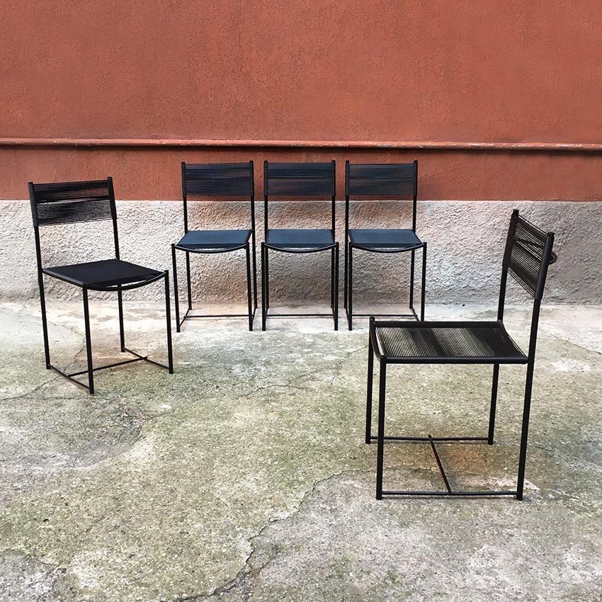 Italian black metal and Scooby dining chairs, produced by Pluri Bergamo, 1970s. Set of 5 dining chairs from the 1970s, with black enameled metal structure and seat and back in black Scooby, produced by Pluri Bergamo.
 