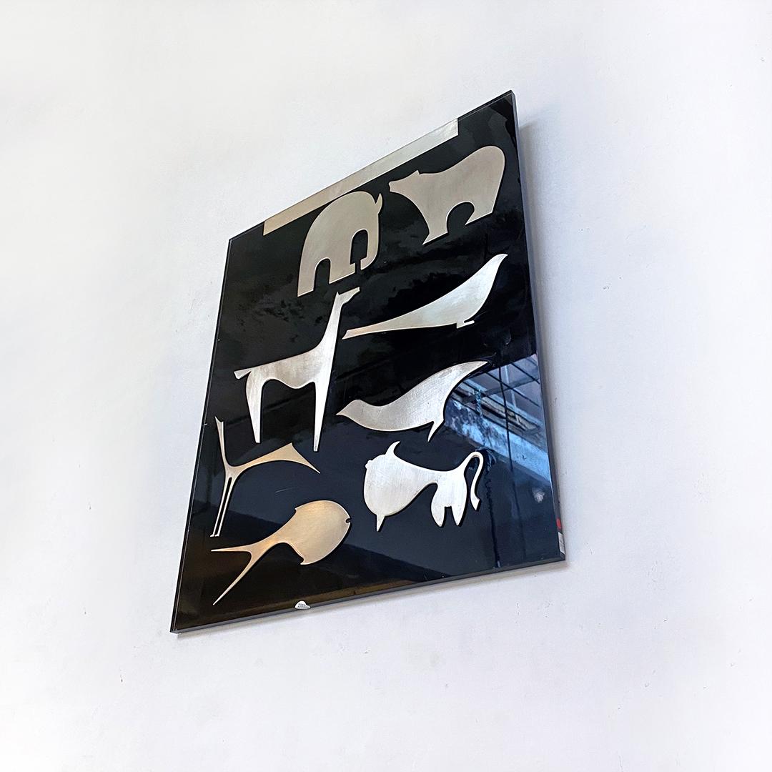 Italian black plexiglass decorative panel with animal by Lino Sabattini, 1980s
Black plexiglass decorative panel with eight silhouettes of animals in silver-plated brass by Lino Sabattini.

Unique piece, Bregnano. Good condition.

Measures: 45