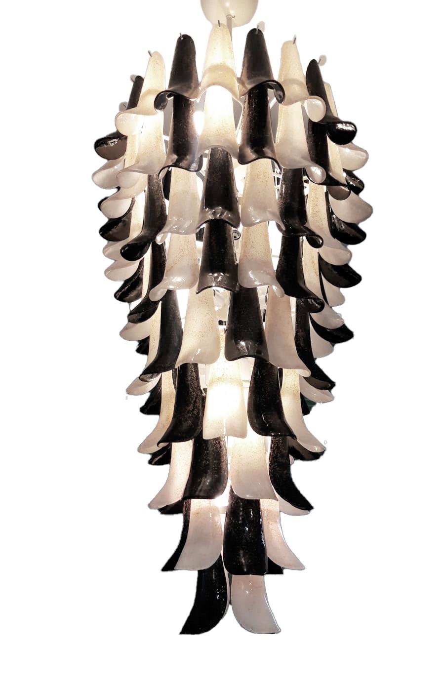 2 available - Iconic black and white for this stunning Venetian creation of Hollywood Regency glamour, this organic modern huge chandelier is composed of blown Murano glass elements as curved leaves, called Selle, the Italian word for saddles