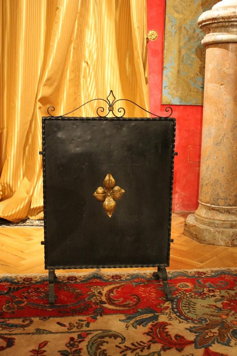 Arts and Crafts Italian Black Wrought Iron and Parcel-Gilt Freestanding Fire Place Screen For Sale