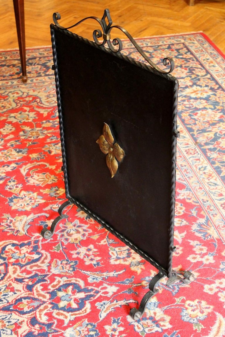 Blackened Italian Black Wrought Iron and Parcel-Gilt Freestanding Fire Place Screen For Sale