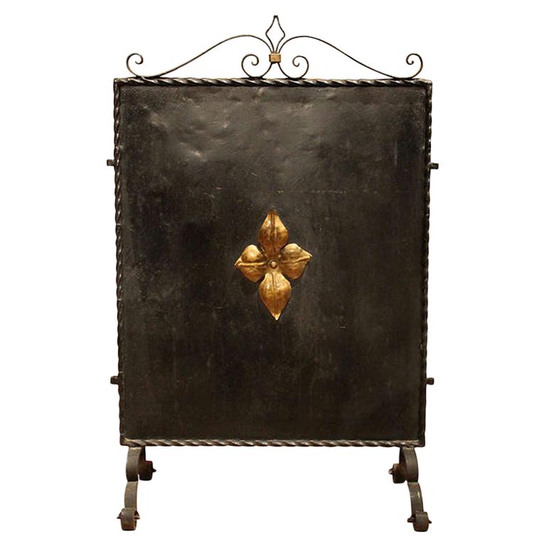 Italian Black Wrought Iron and Parcel-Gilt Freestanding Fire Place Screen For Sale