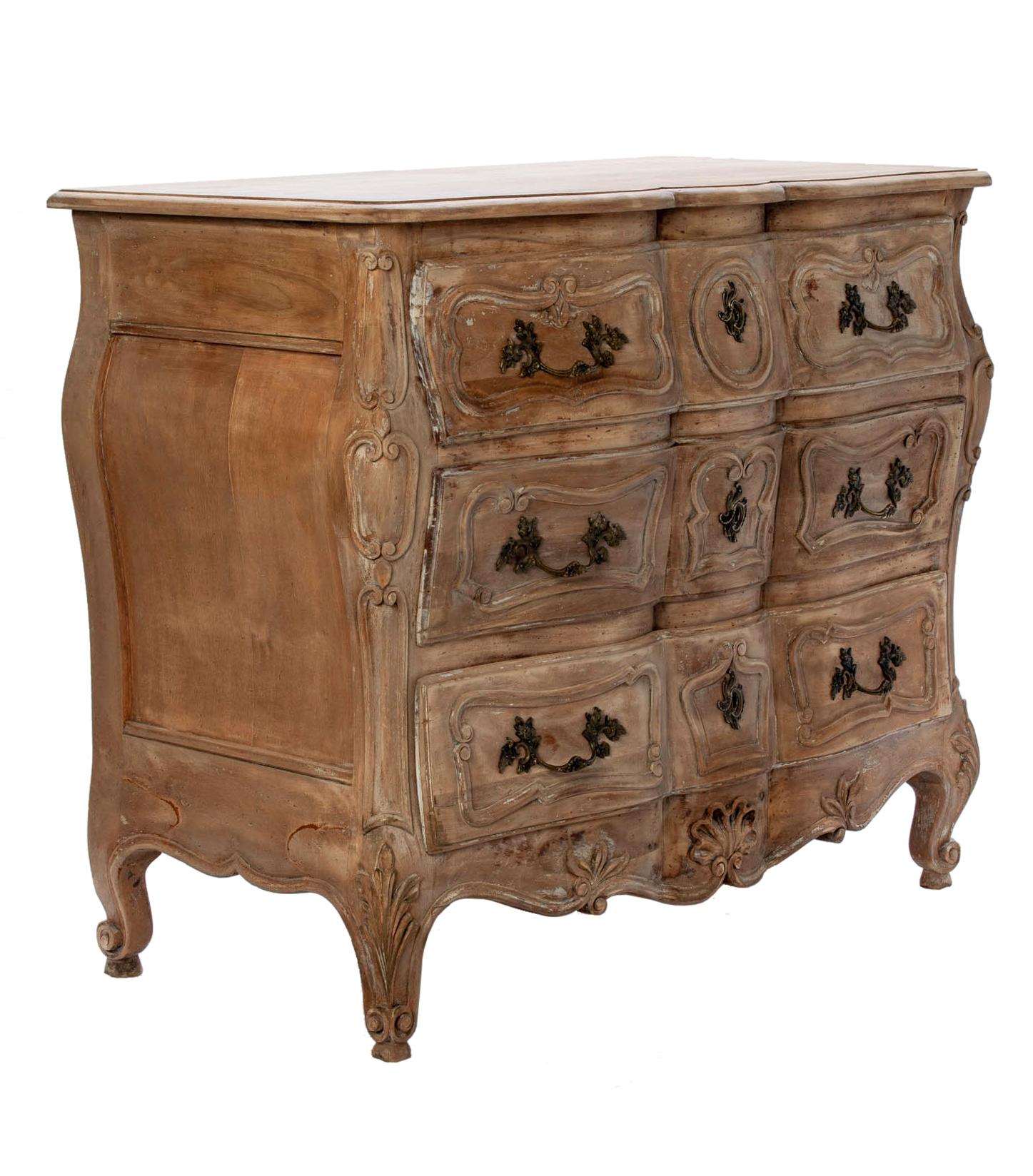 Keyed chest, stunning examples of Louis XV style commodes with a rustic twist. Handcarved details throughout. The original keys are included & open each drawer. Nude finish with blush of clear English bees wax.
The hardware is made of cast brass.