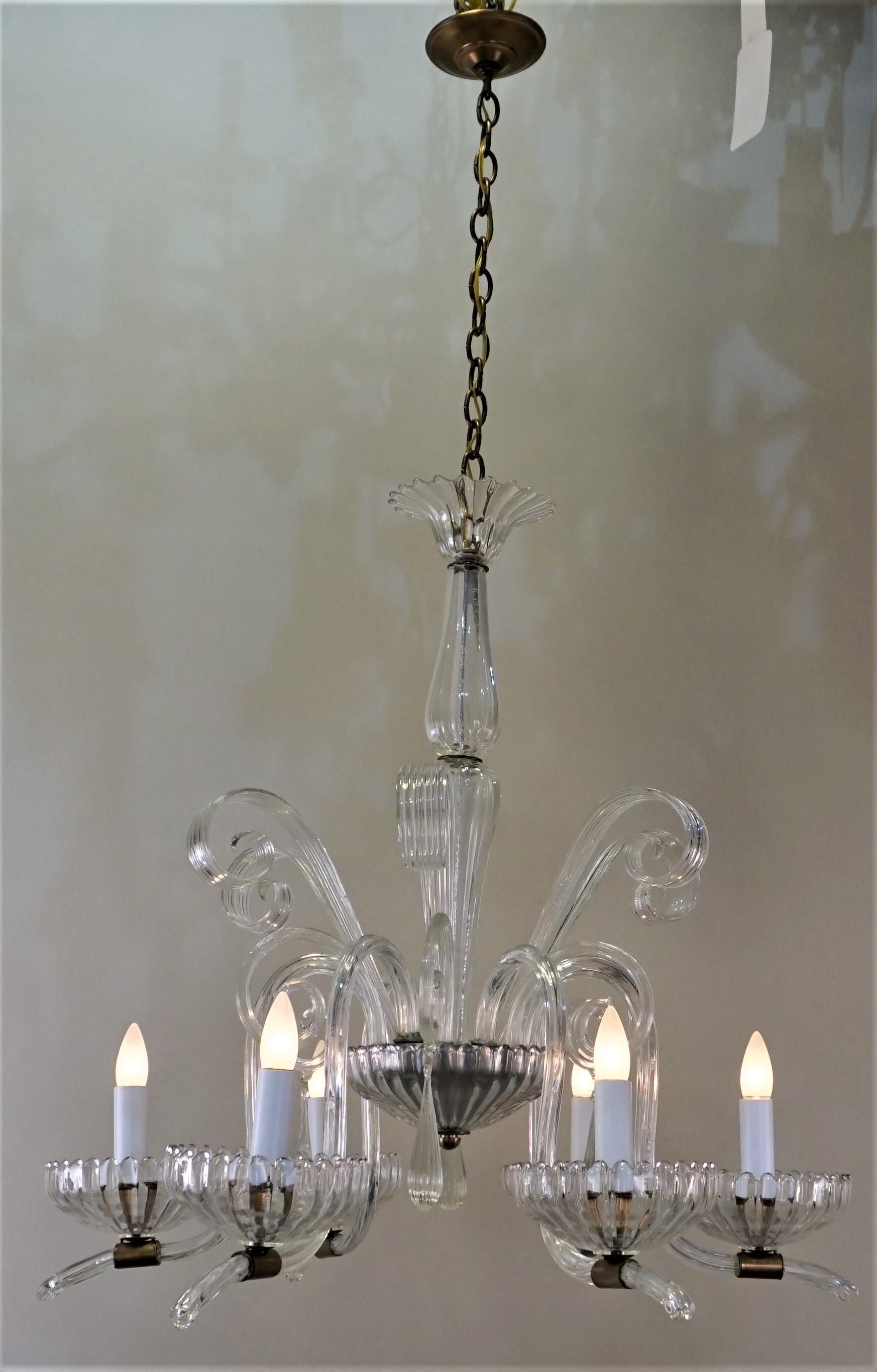 A fabulous blown glass six-arm chandelier attributed to Barovier & Toso.
Measures: Total height 54