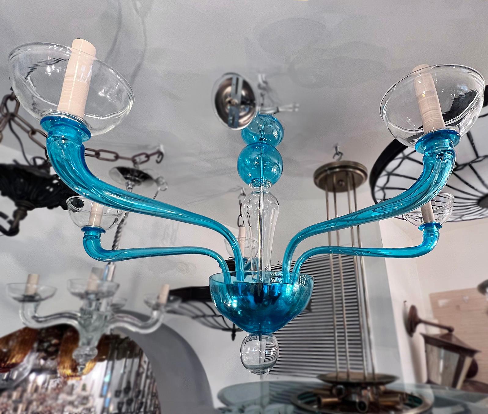 A circa 1960s Italian blown Murano glass chandelier with 5 lights.

Measurements:
Drop: 21