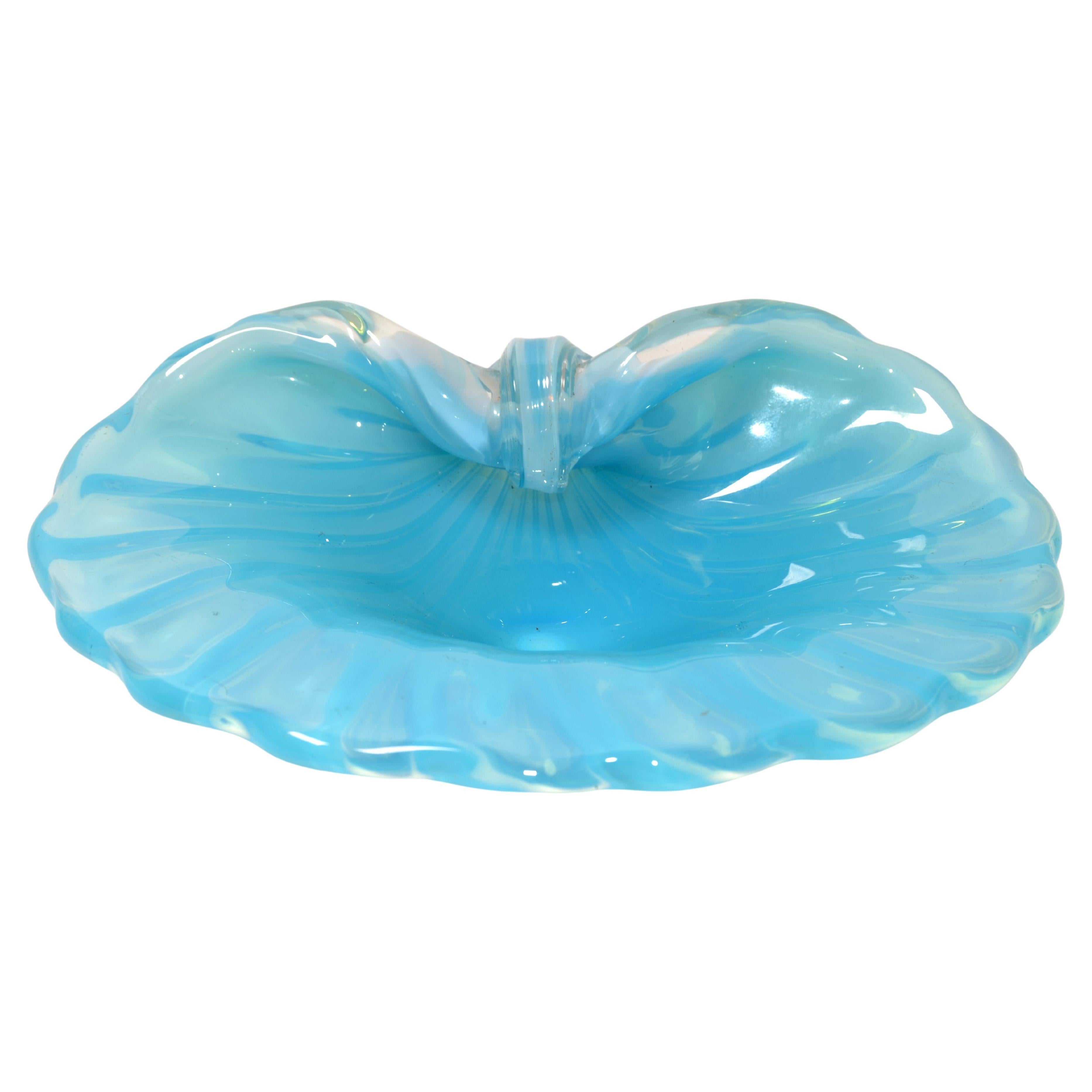 Italian blown Murano glass two-color blue and goldenrod Clam Shell shaped catchall, bowl or vide poche.
Baby blue interior that takes on an organic look, light golden yellow elements.
Simply beautiful.
