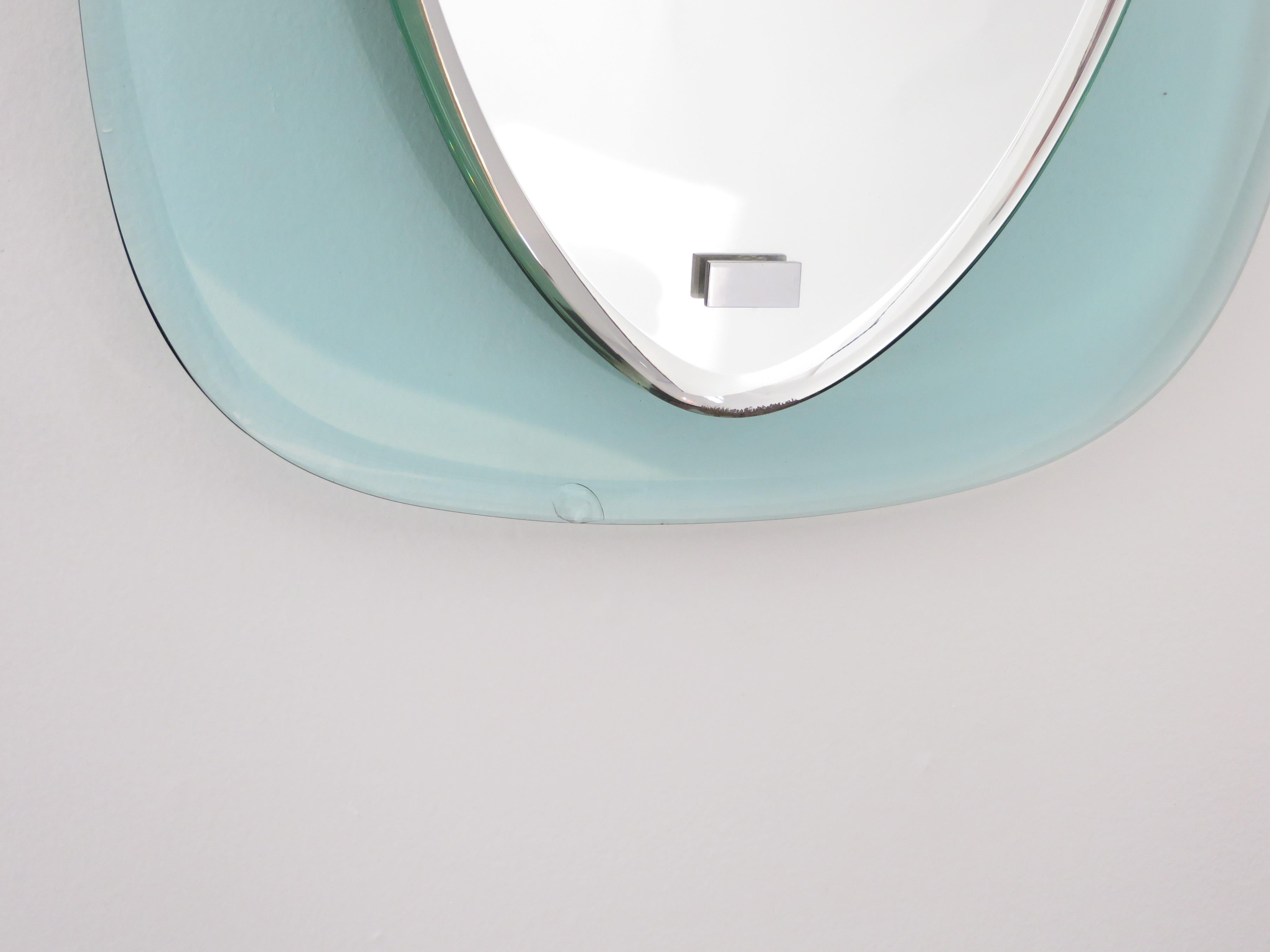 Arte miroir italien en cristal ovale facetté flottant en verre bleu et transparent en vente 2