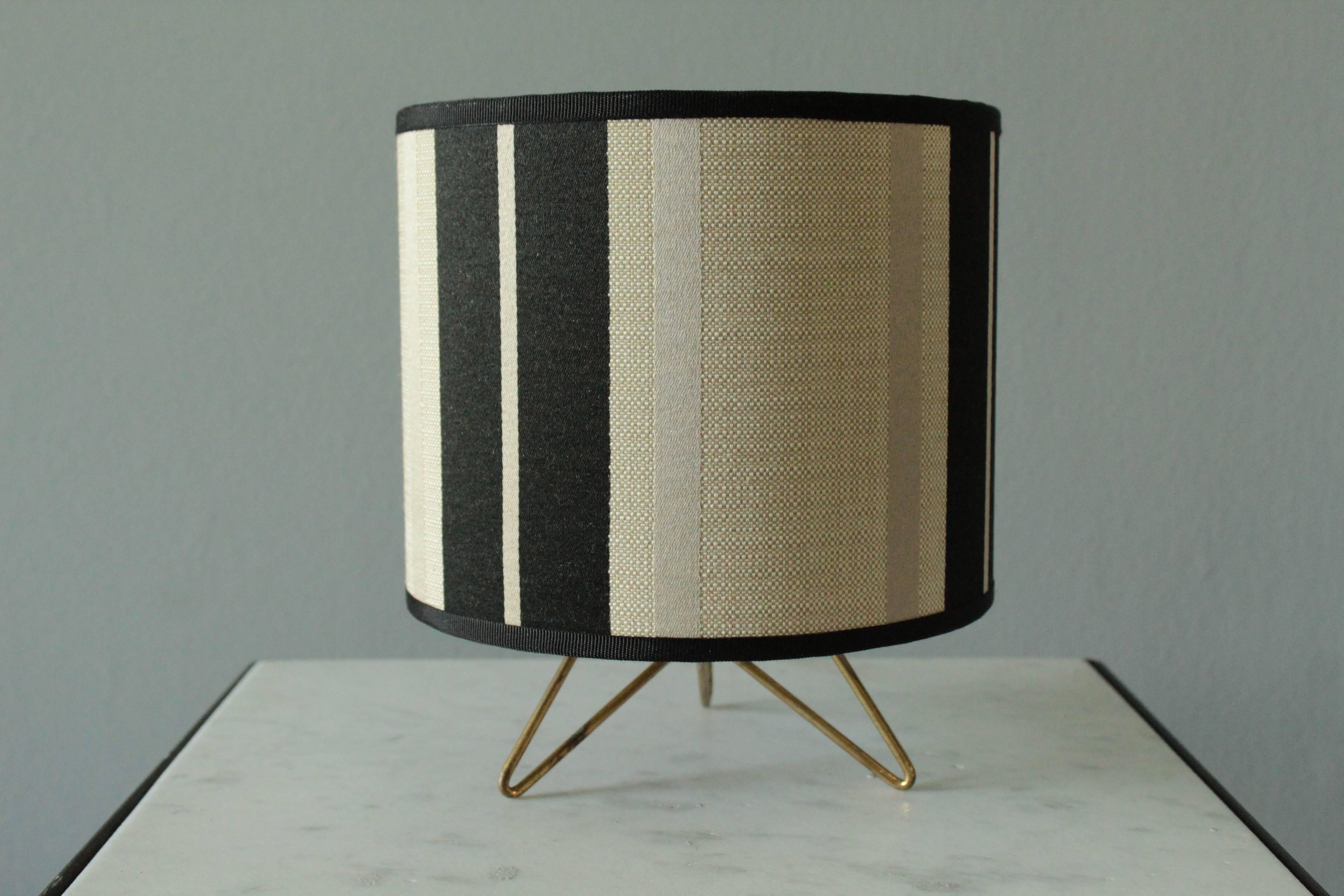 Table lamp with lampshade made of striped jacquard. Made in Italy, circa 1950.