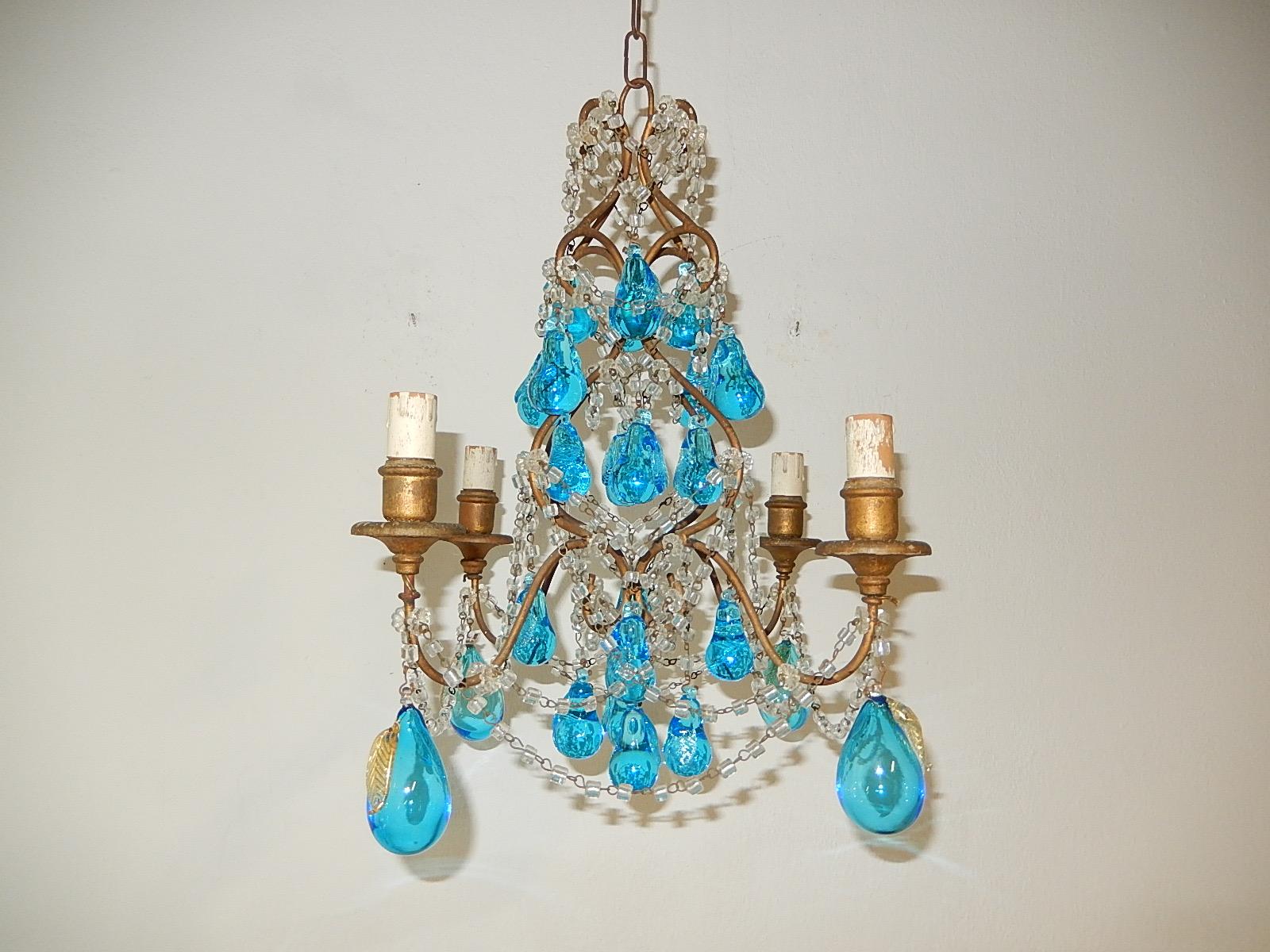 One of a kind 4 lights, sitting on wood posts. Will be newly rewired with certified US UL sockets for the Usa and appropriate sockets for all other countries and ready to hang.  Adorning aqua blue Murano pears and rare huge Murano blown pears with