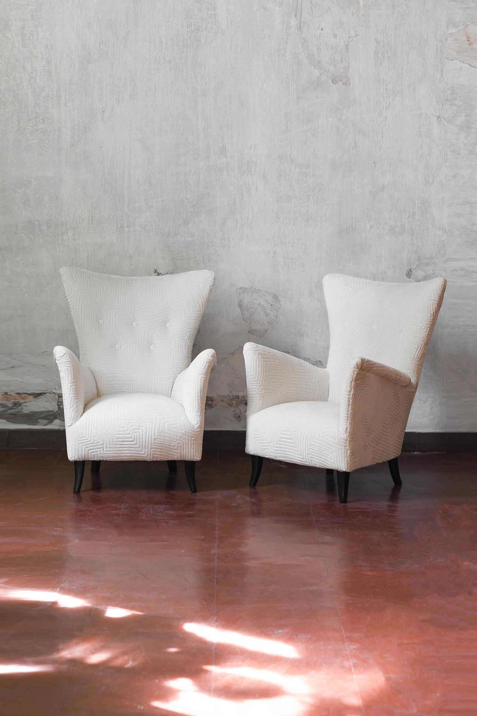 Pair of Mid-Century armchairs in Dedar fabric - Deja Vu Jamais / Ivory
Dimensions of the single armchair: 50 W x 78 H x 56 D cm
Materials: wood, cotton 
Production: 1950s Italian manufacture