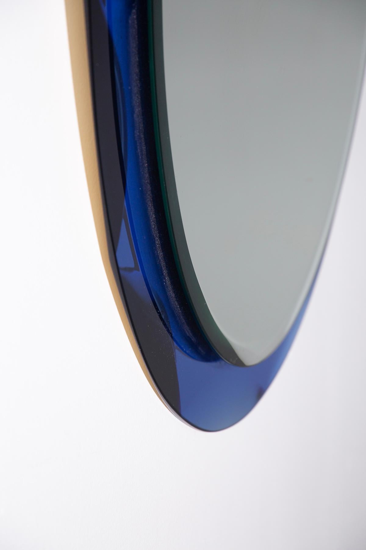 Glass Italian blue glass wall mirror by MetalVetro, Label For Sale