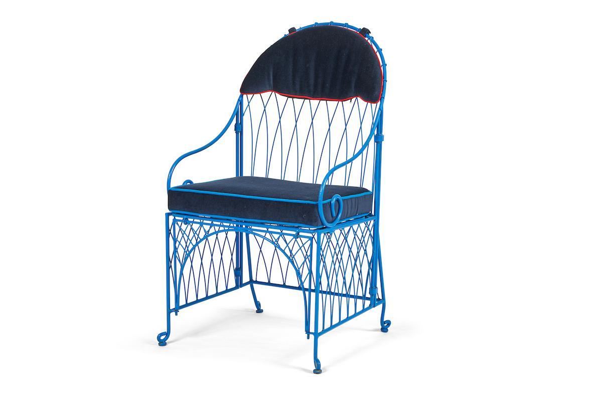 Pair of vintage Italian iron folding chairs. Bright cerulean blue powder-coated frame, with new navy blue velvet upholstery. The seat is piped in bright blue velvet and the bikini top is piped in a vermillion French grosgrain. The upholstery