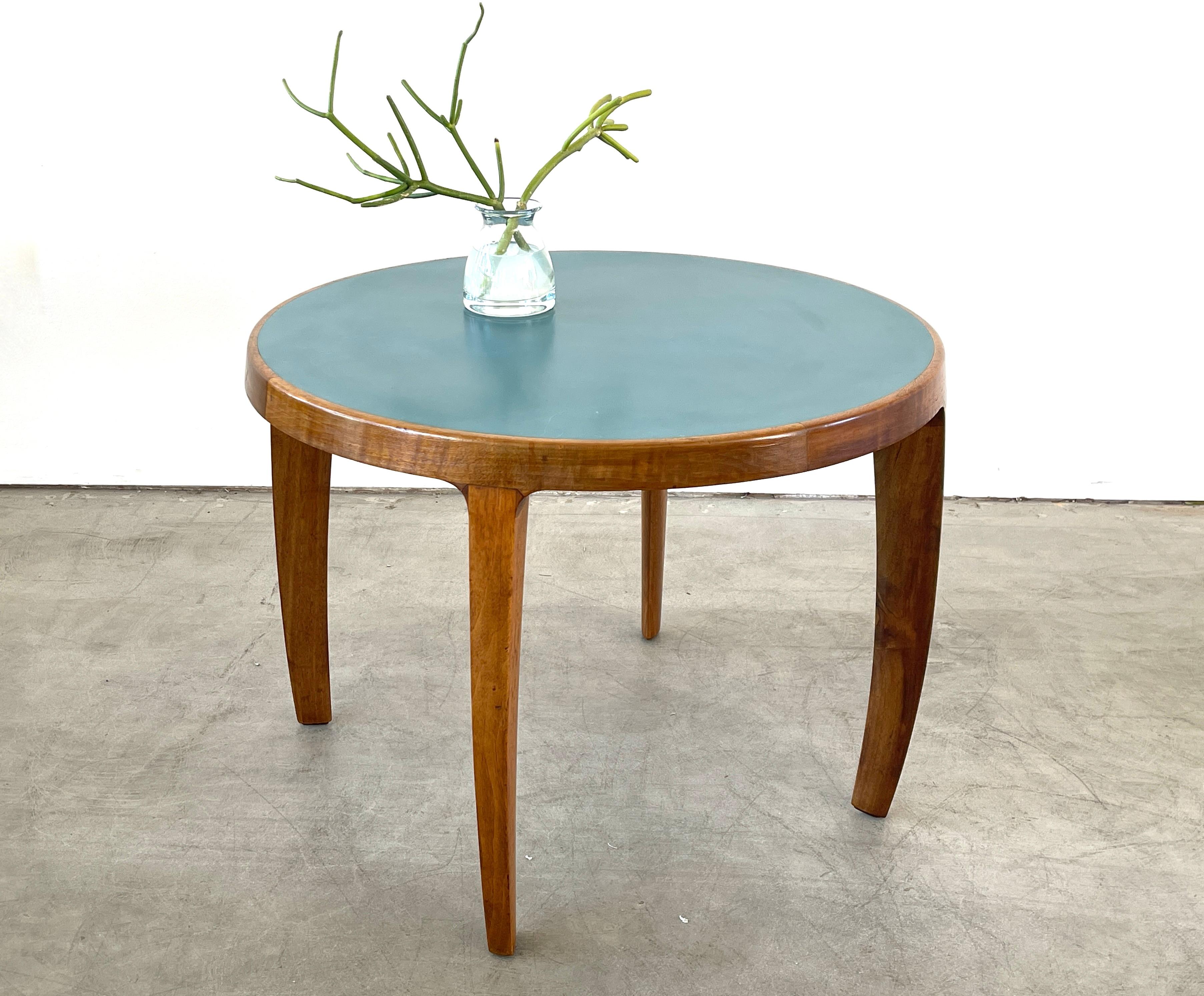 Beautiful round side table with lines inspired by Gio Point
Graceful tapered legs with original turquoise blue laminate top.