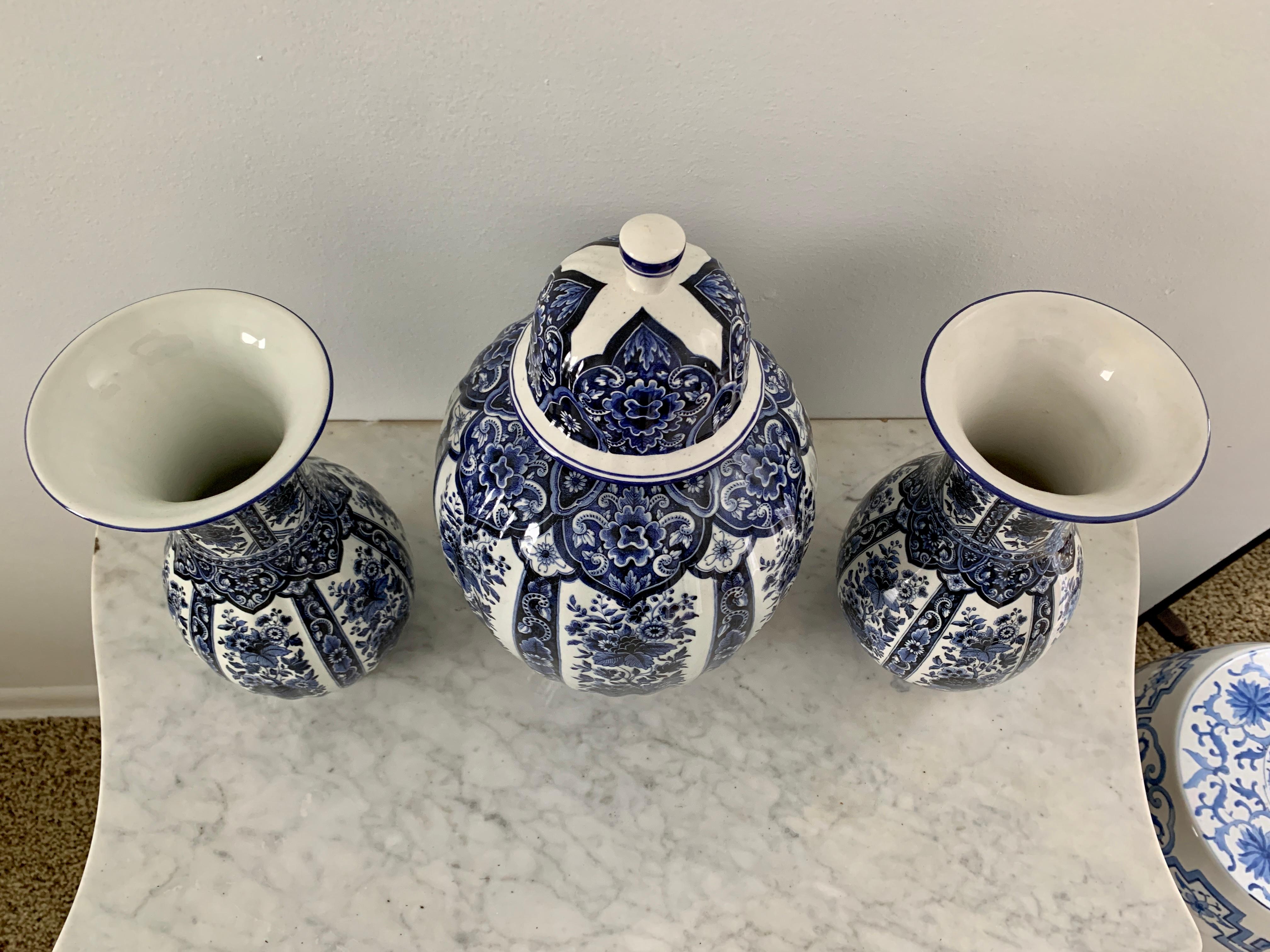 A wonderful set of beautiful Italian Chinoiserie or Delft style blue and white porcelains, including two vases and one covered jar. An instant collection! 

By Ardalt Blue Delfia

Italy, Mid-20th Century

Vases Measure: 5.25