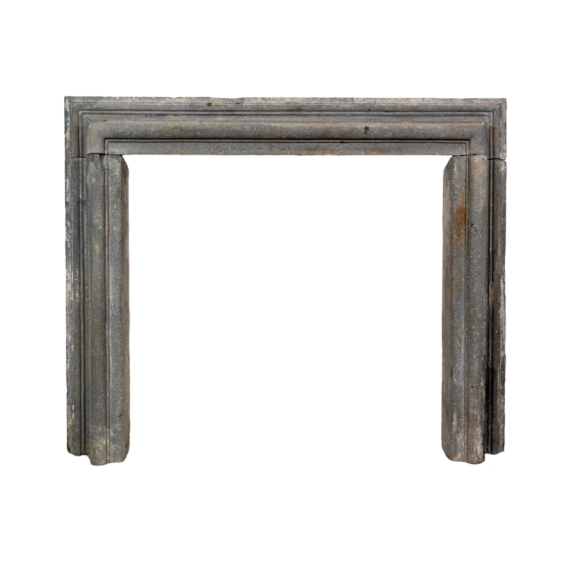 This Italian Bluestone Mantel is a rare find, dating back to the early 1800s. Handcrafted from authentic Italian bluestone, its petite style adds a charming touch to any fireplace. Transform your home with this antique mantel and bring a piece of