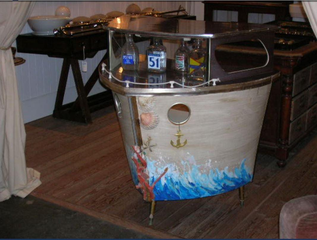 boat shaped bar cabinet