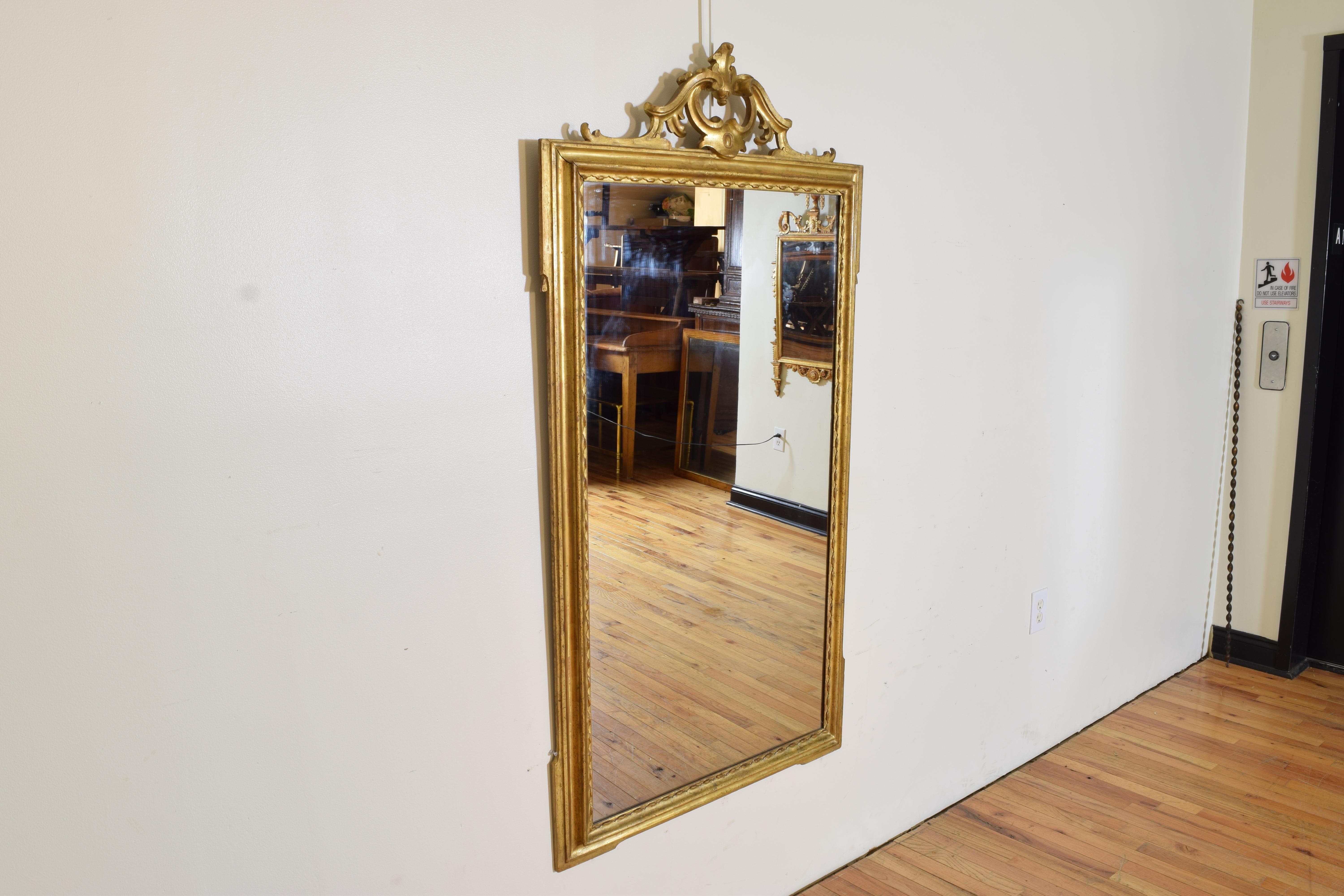 Neoclassical Italian, Bologna, Early Neoclassic Carved Giltwood Vertical Mirror, ca. 1785 For Sale