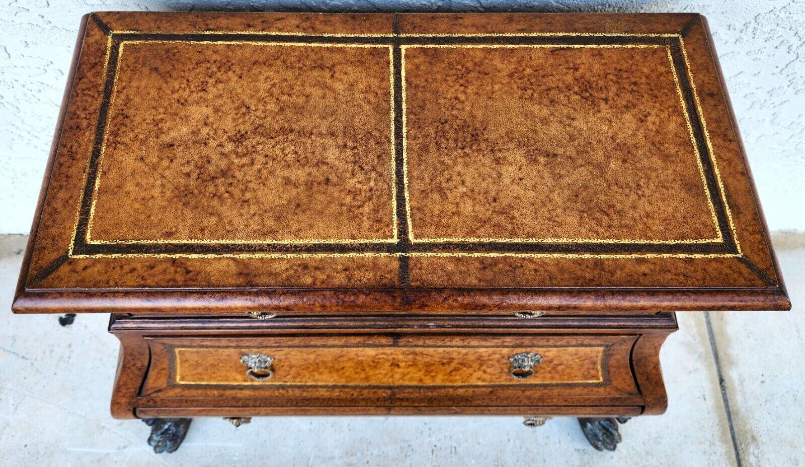 For FULL item description click on CONTINUE READING at the bottom of this page.

Offering One Of Our Recent Palm Beach Estate Fine Furniture Acquisitions Of An 
Italian Leather Wrapped Nightstand Bedside Table Bombay Chest Commode
With solid brass