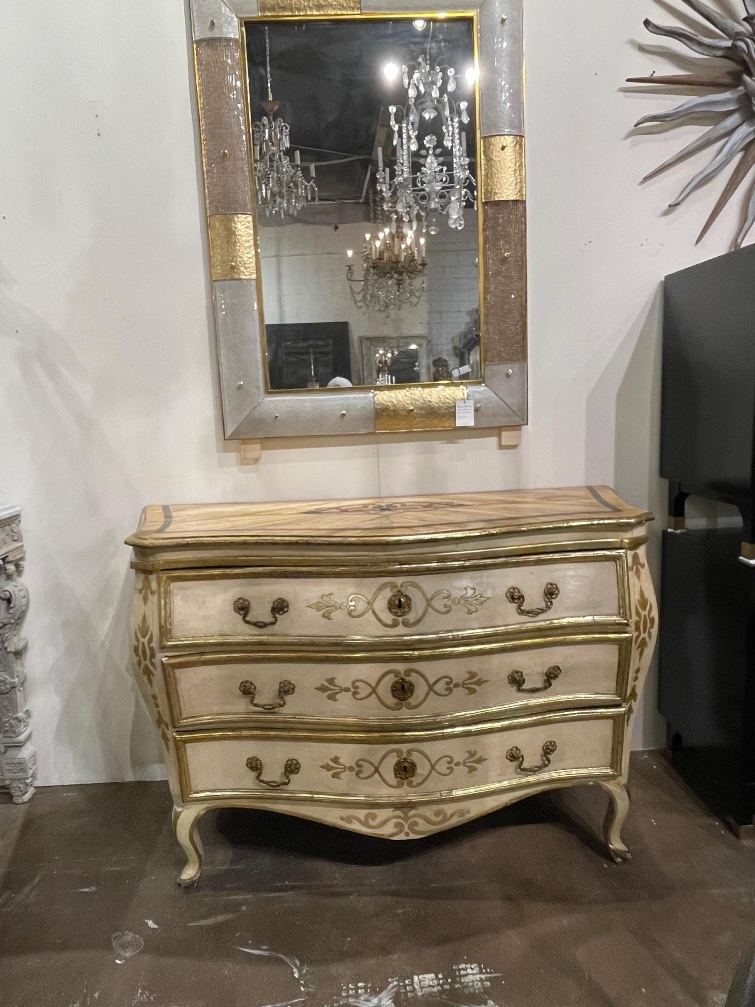 Fine 18th century Italian lacquered and gilded bombe shaped commode, Circa 1780. This commode has a beautiful patina. Sure to make a statement in any home.
