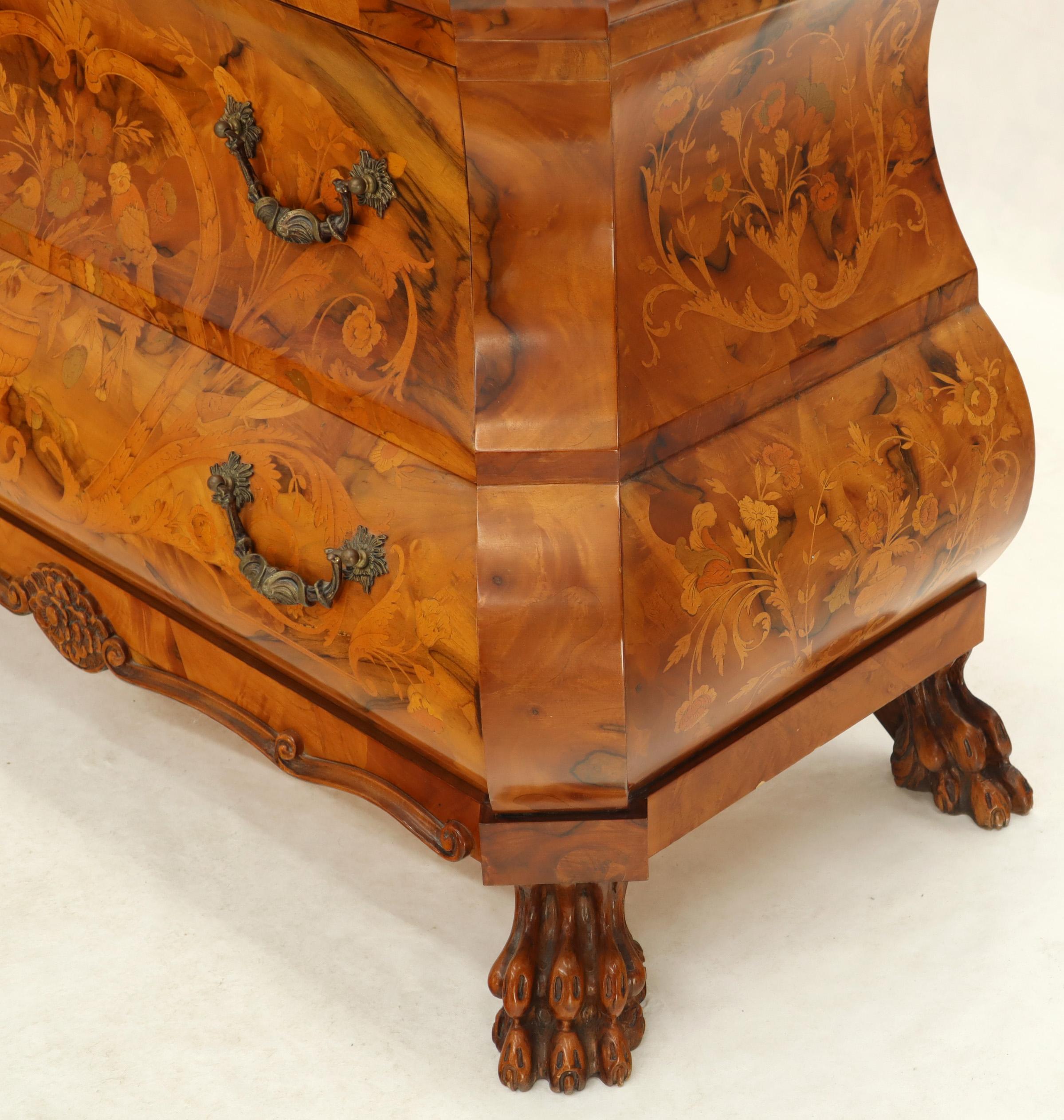 Very fine Italian inlay bombe dresser. Olive wood, heavy carved claw feet, intricate inlay, drop front jewelry secretary compartment.
Excellent vintage condition. Stunning piece.