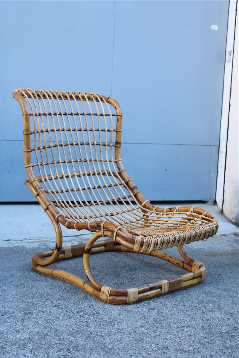 Large Historical armchair Produced by Bonacina to a design by Tito Agnoli in the 1950s, in Curved and Shaped Rattan with net, model BP9.