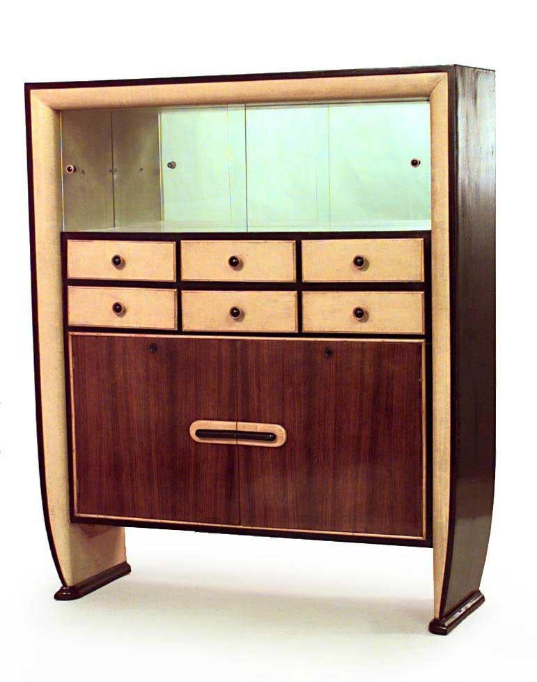 Italian 1940s rosewood and parchment cabinet with ebonized trim and 2 sliding glass top doors and 2 large doors at bottom with 6 small drawers (attributed to OSVALDO BORSANI)
